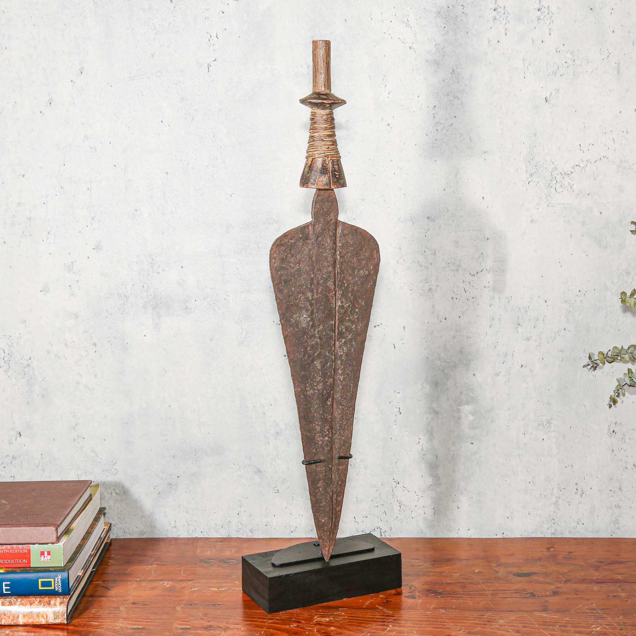 Handmade Copper Kuba Currency Knife from D.R. Congo on a table