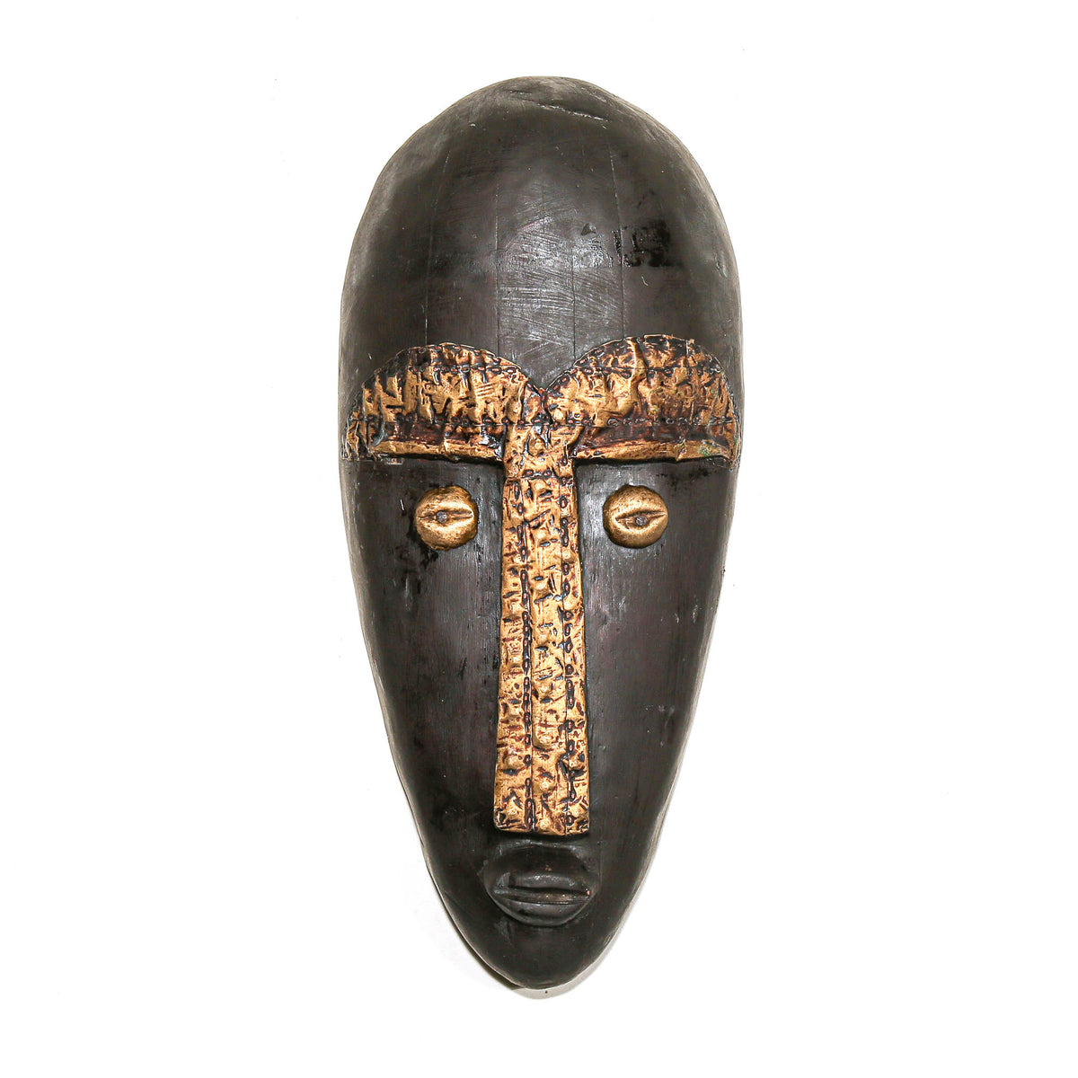A dark carved wooden African-style mask with metallic gold-painted details on the forehead, eyes, and nose bridge, shown against a plain white background.