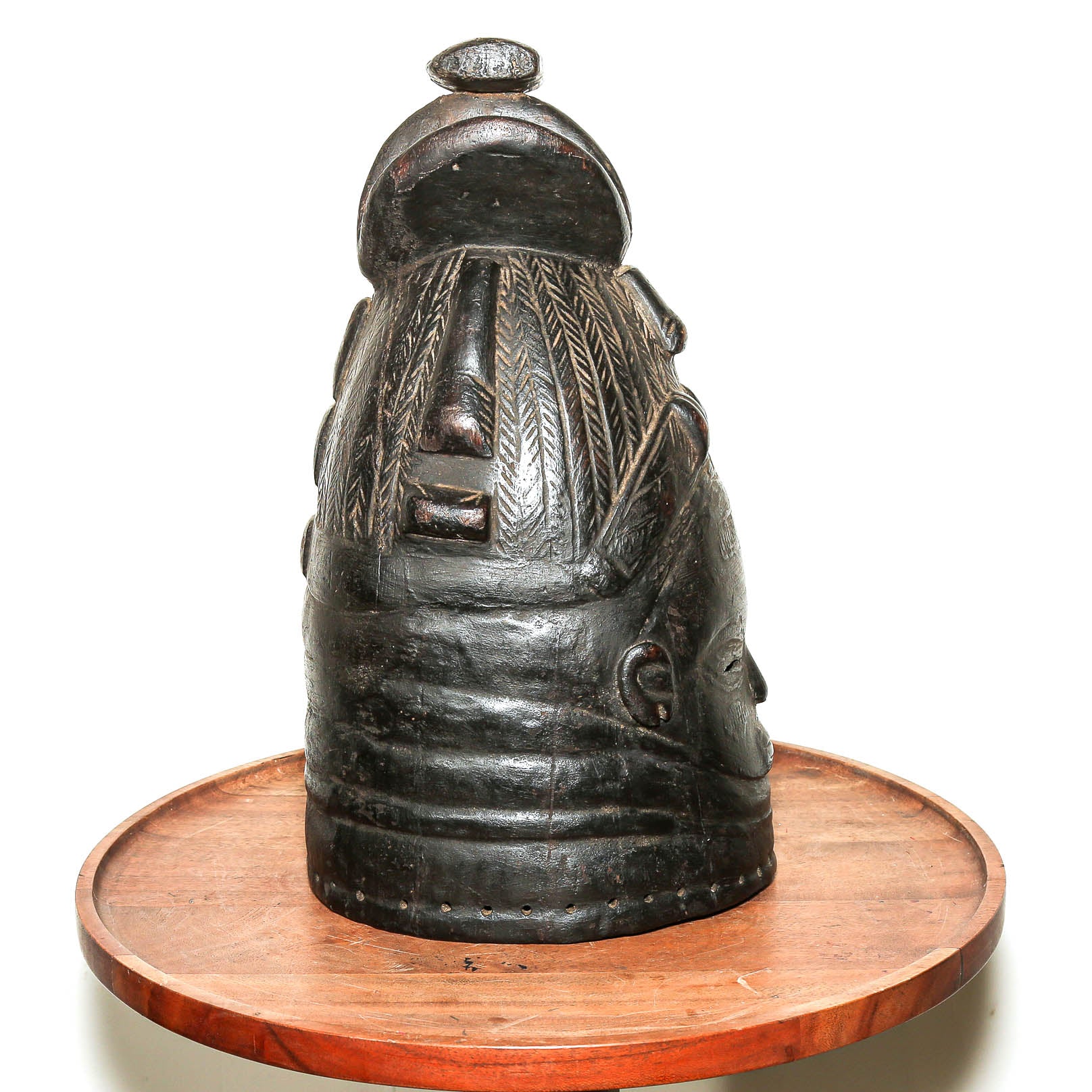 African wood carving from Sierra Leone displayed in a modern home