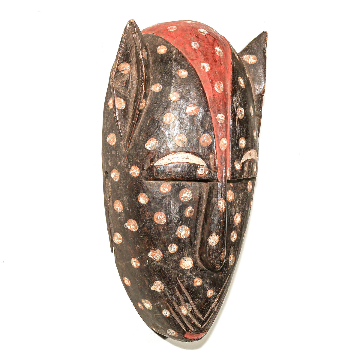 Carved Bamana feline mask from Mali featuring an expressive cat face and distinctive traditional African art form