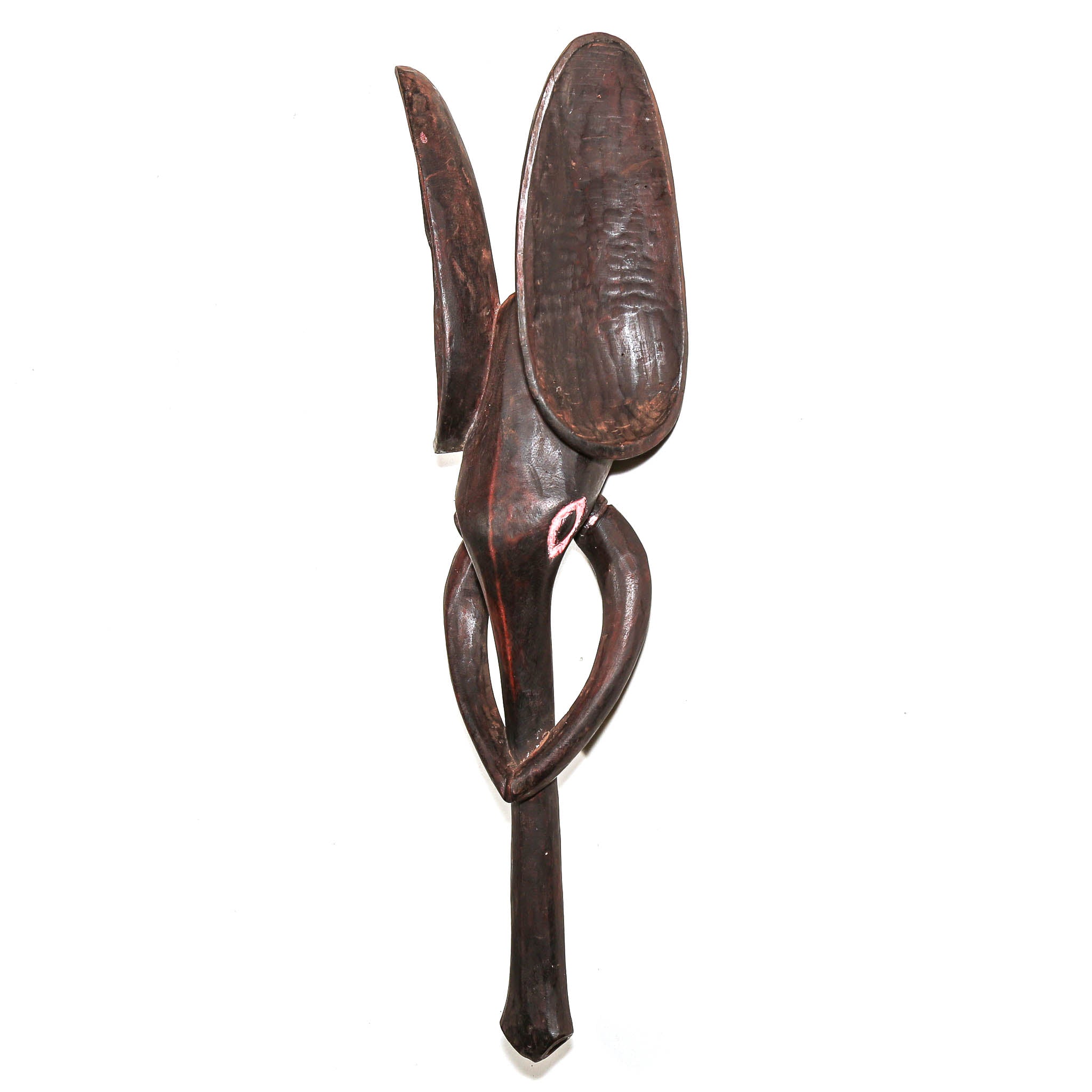 A dark brown carved wooden wall sculpture with abstract curved and leaf-like forms, photographed against a plain white background.