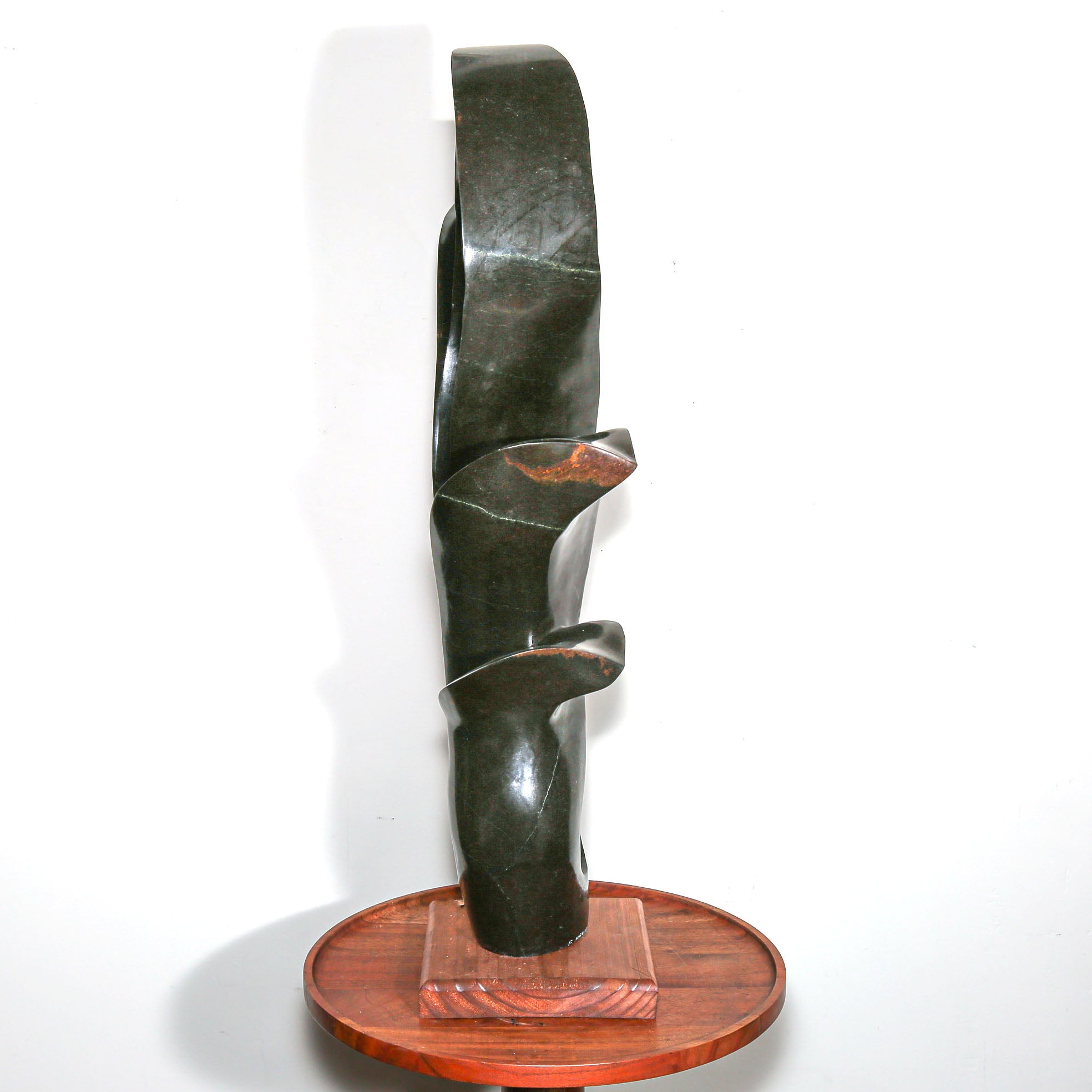 signed modern african sculpture in black stone