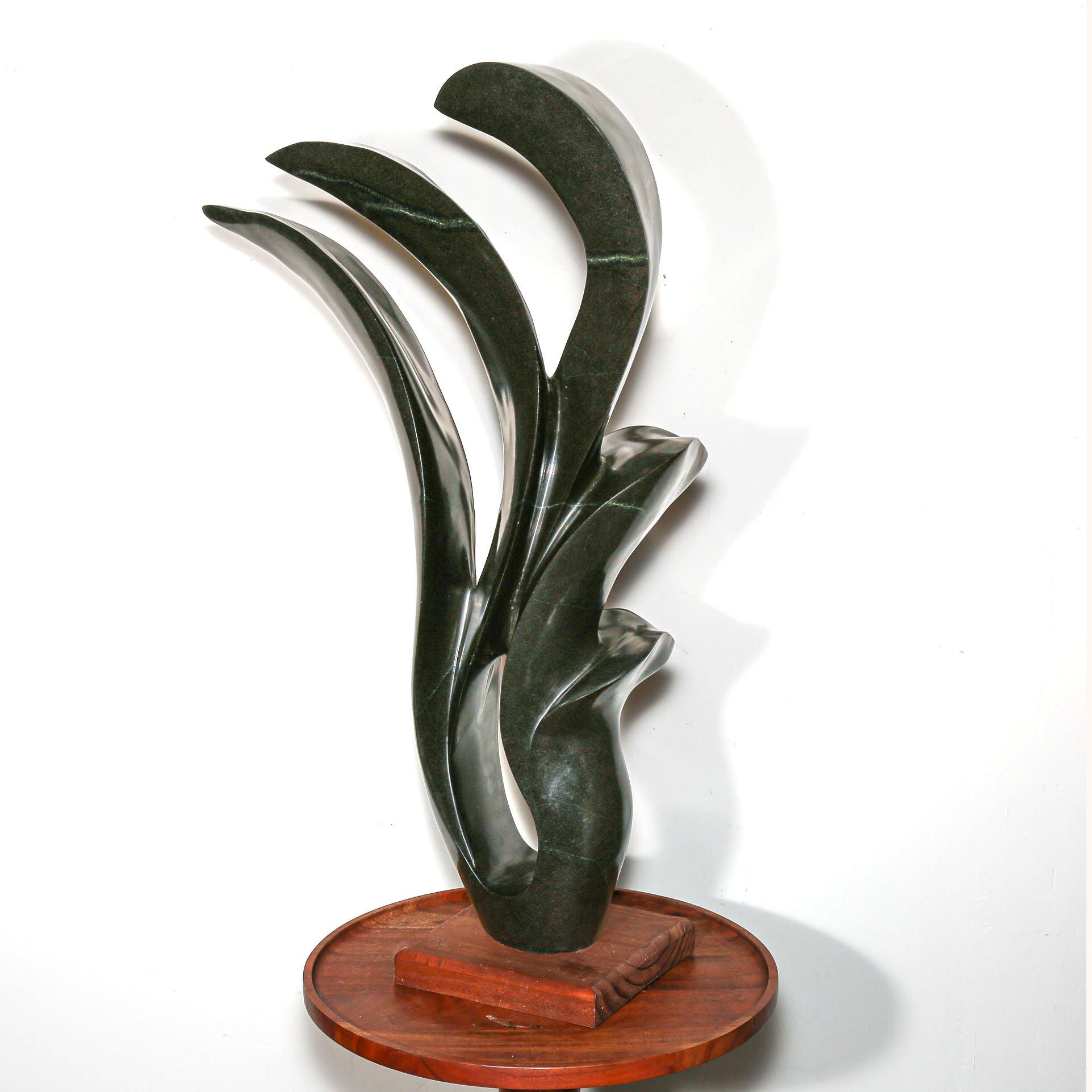 signed modern african sculpture in black stone
