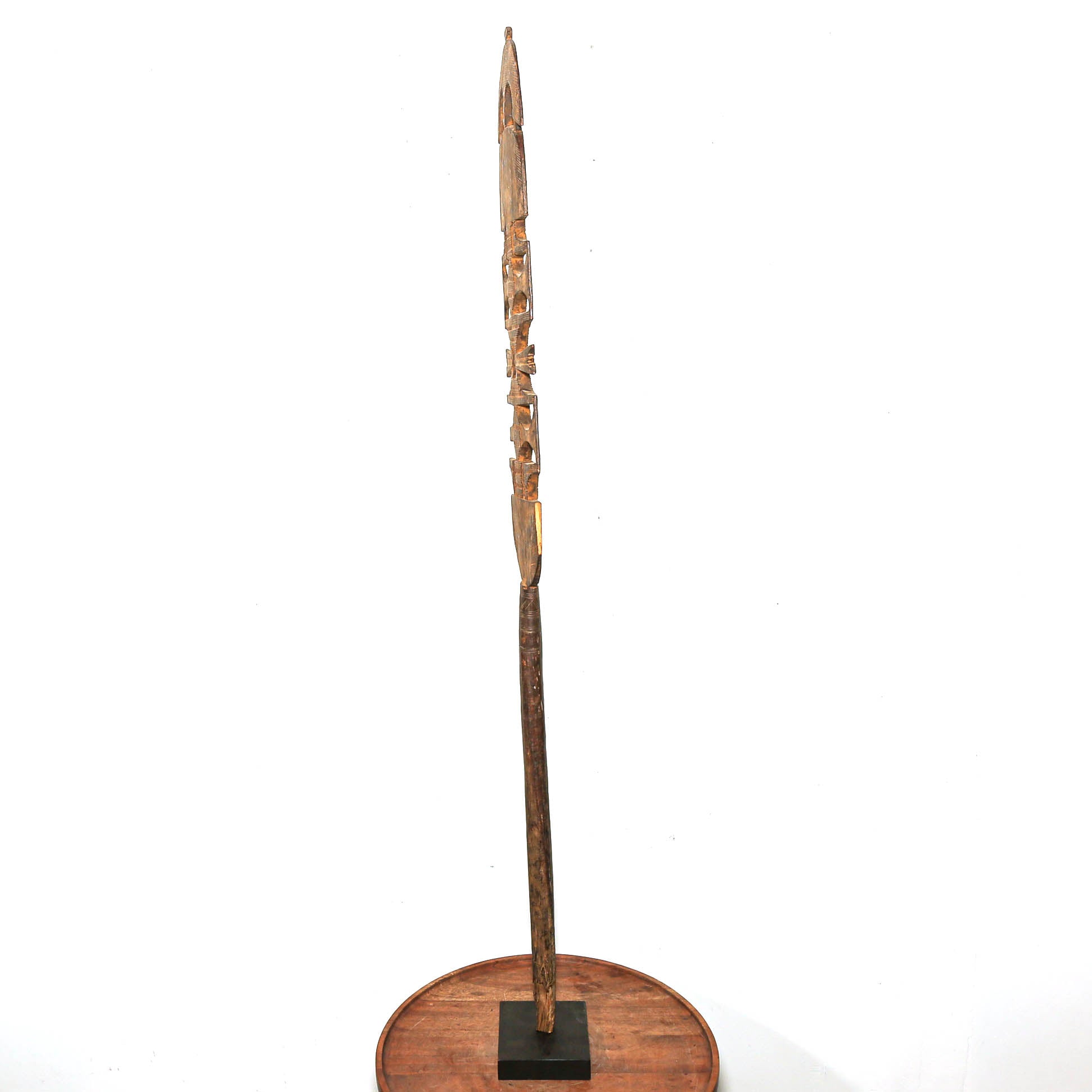 Tall antique Tuareg wooden tent post with carved geometric patterns