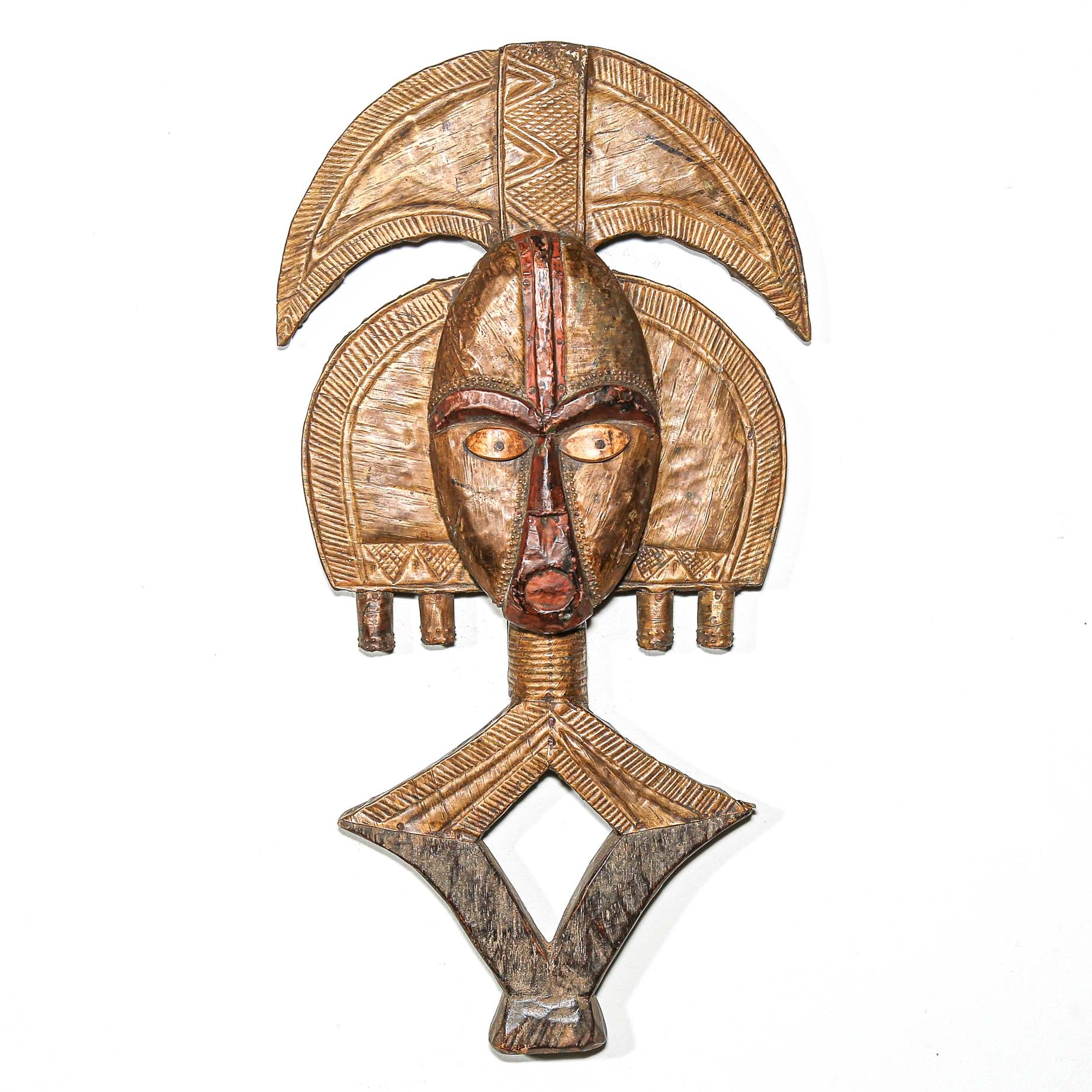 Kota reliquary guardian figure from Gabon with copper and brass overlay protecting ancestral remains