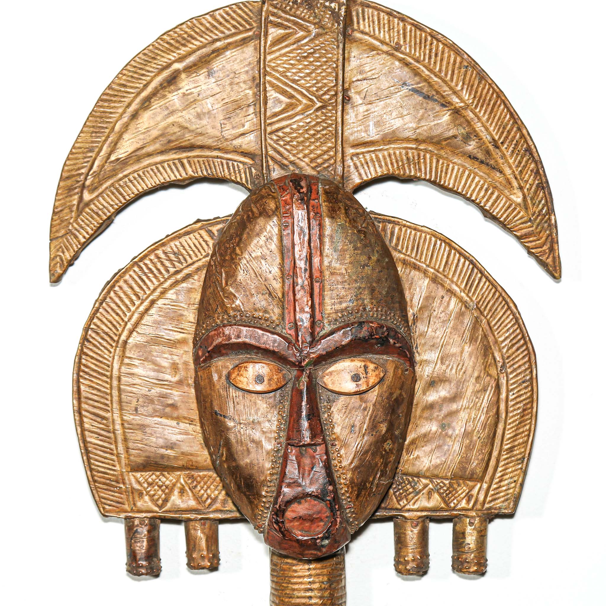 Authentic Kota reliquary figure from Gabon used in ancestral worship with hammered metal surface