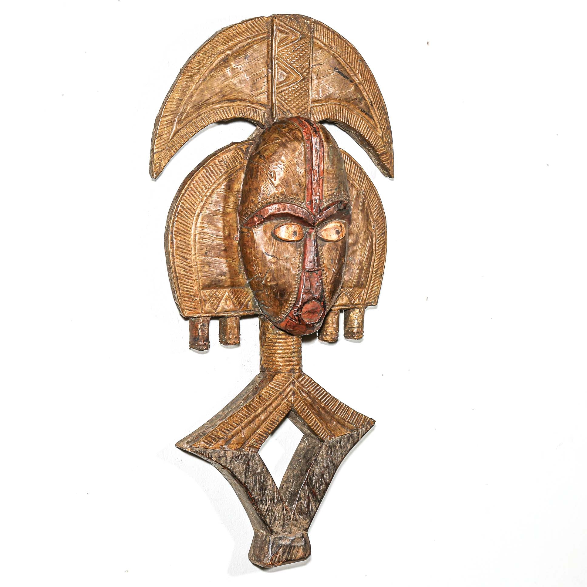 Historic Kota reliquary sculpture from Gabon with copper-clad design for ancestor protection