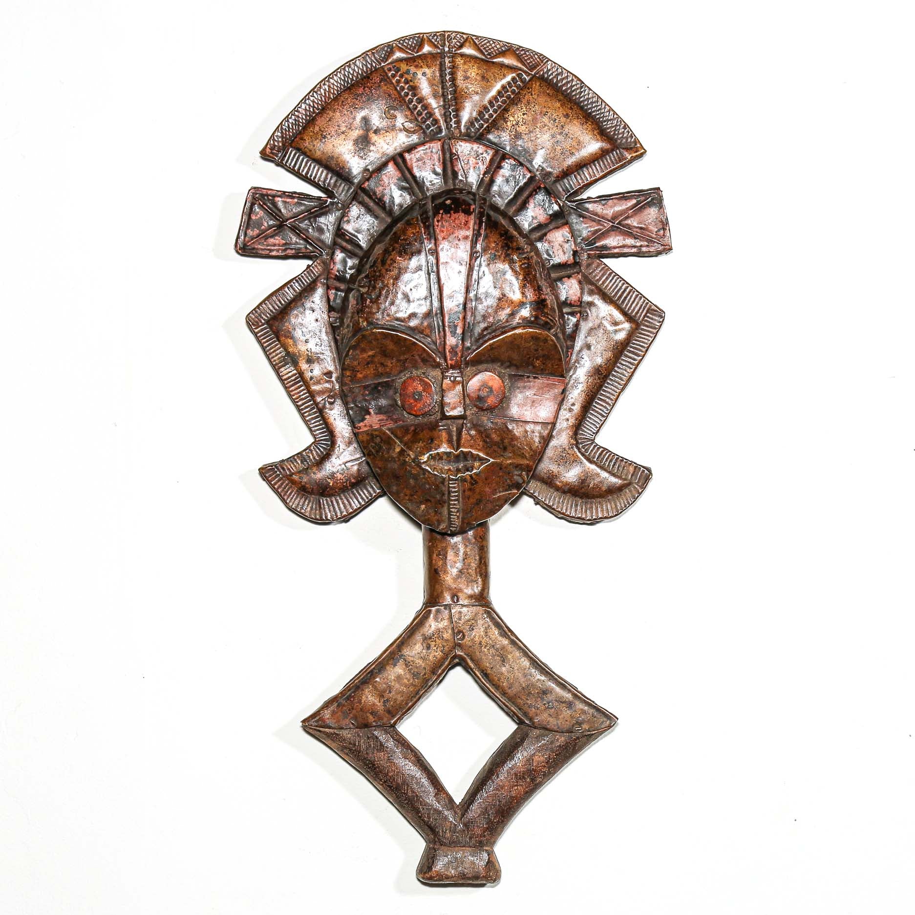 African Kota guardian figure from Gabon featuring oval face and spiritual symbolism