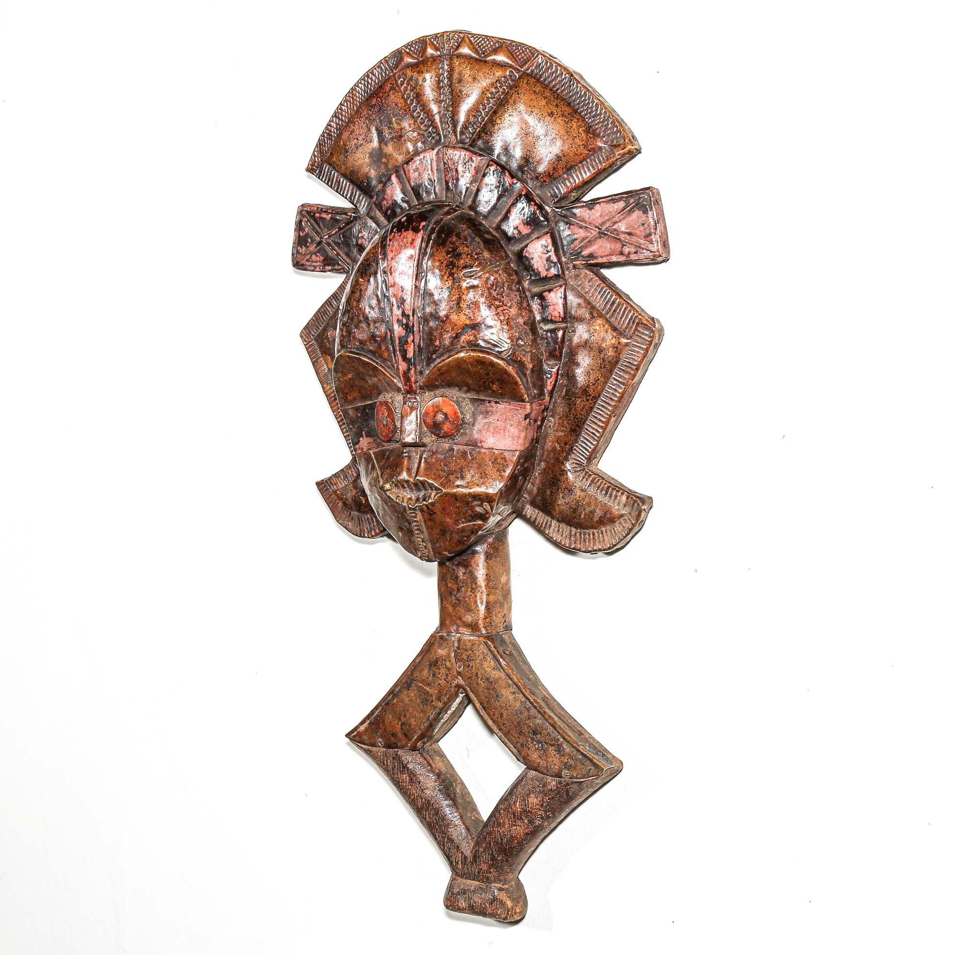Authentic Kota reliquary figure from Gabon used in ancestral worship with hammered metal surface