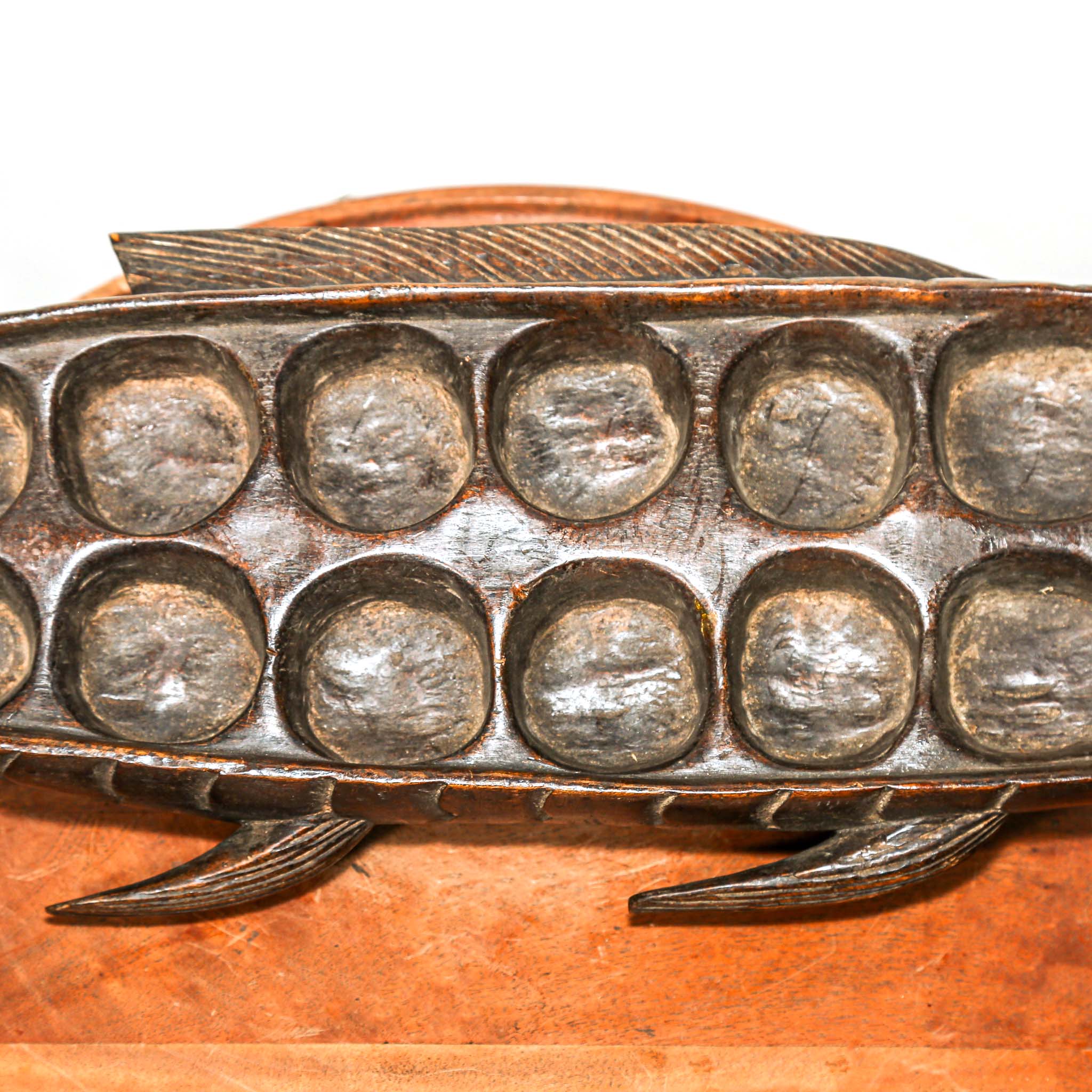 hand carved Wooden fish-shaped mancala game for table decor