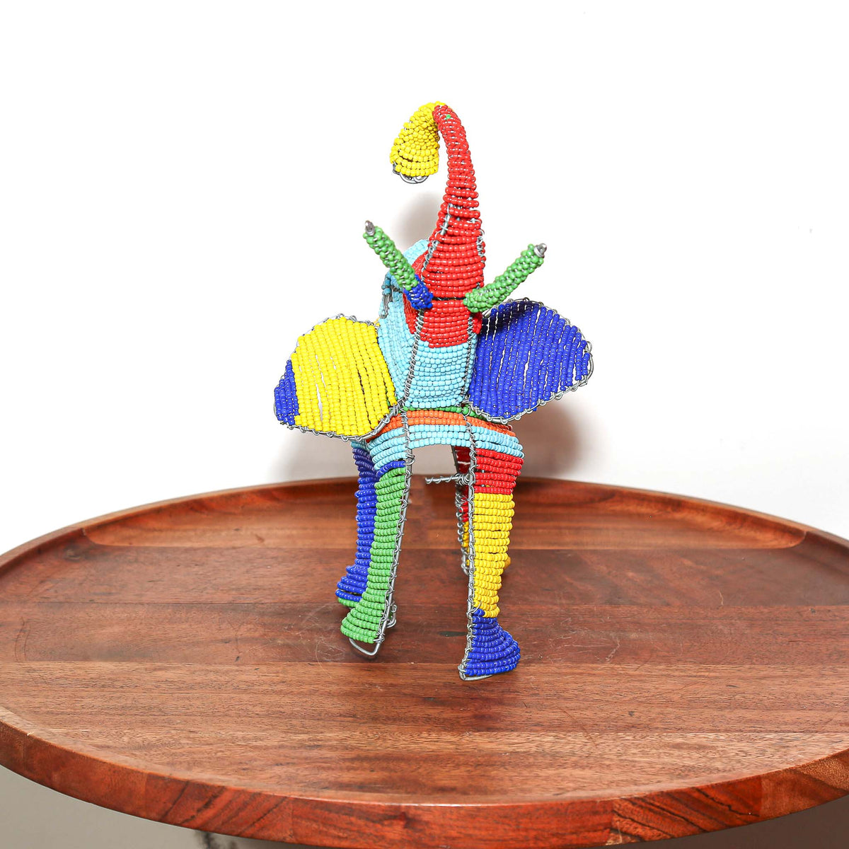 Miniature colorful elephant made with beads and wire by hand in South Africa, ideal for shelf, desk, or gift display