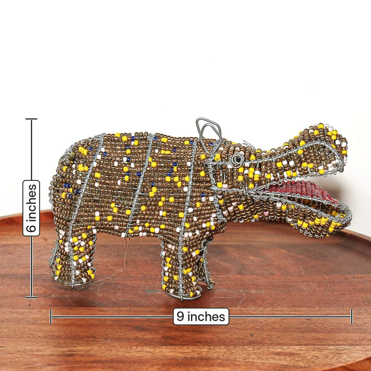Colorful beaded hippo sculpture featuring shaped wire construction and detailed artisan work from South Africa