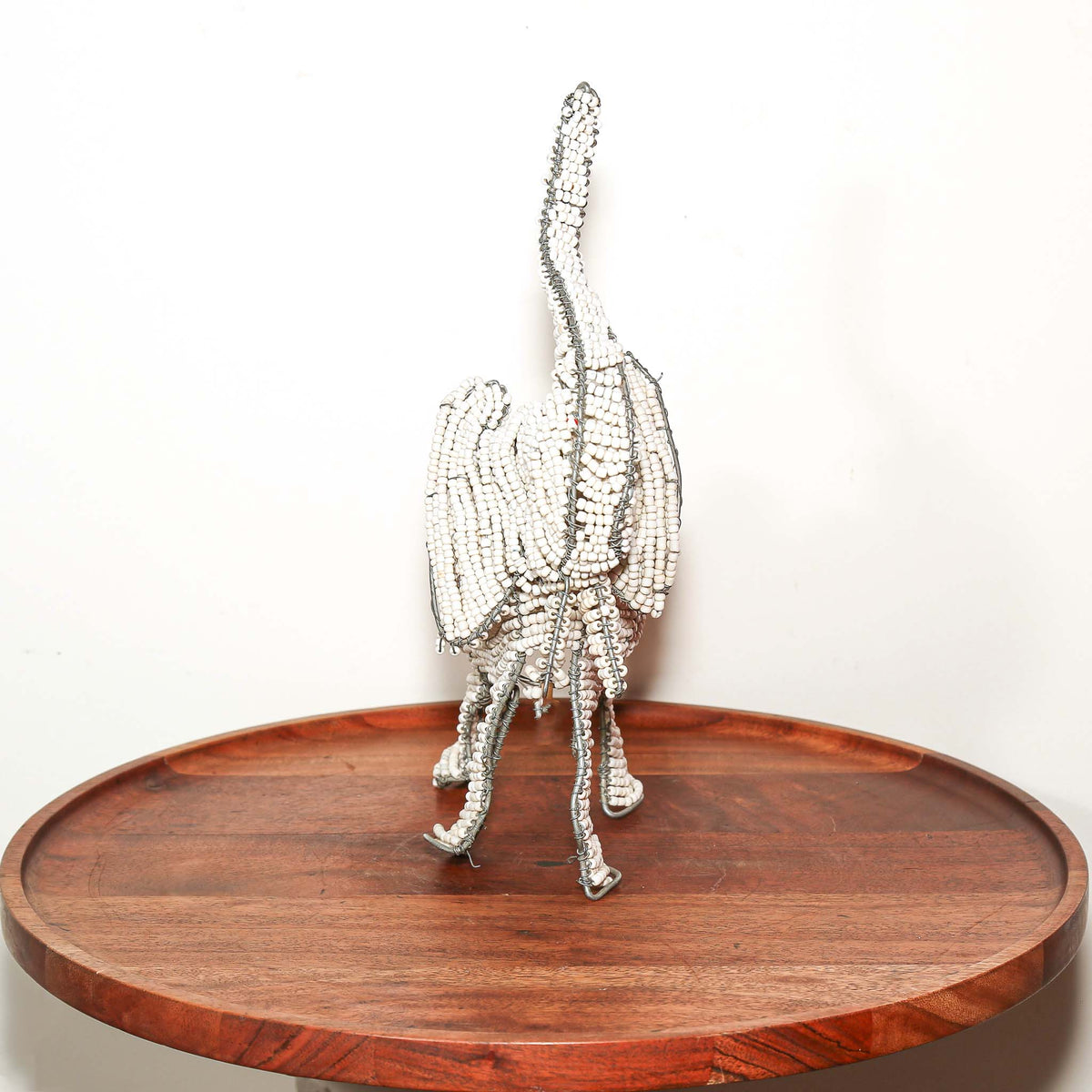 Decorative white beaded elephant from South Africa designed as a compact handmade African animal sculpture