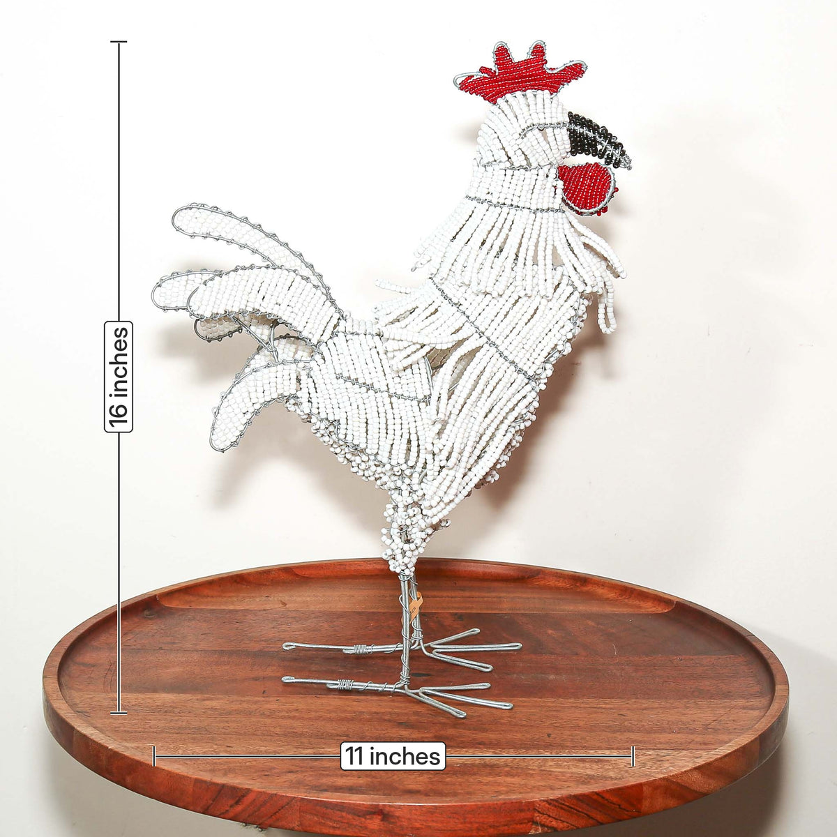Small beaded rooster sculpture featuring shaped wire construction, colorful accents, and handmade South African craftsmanship