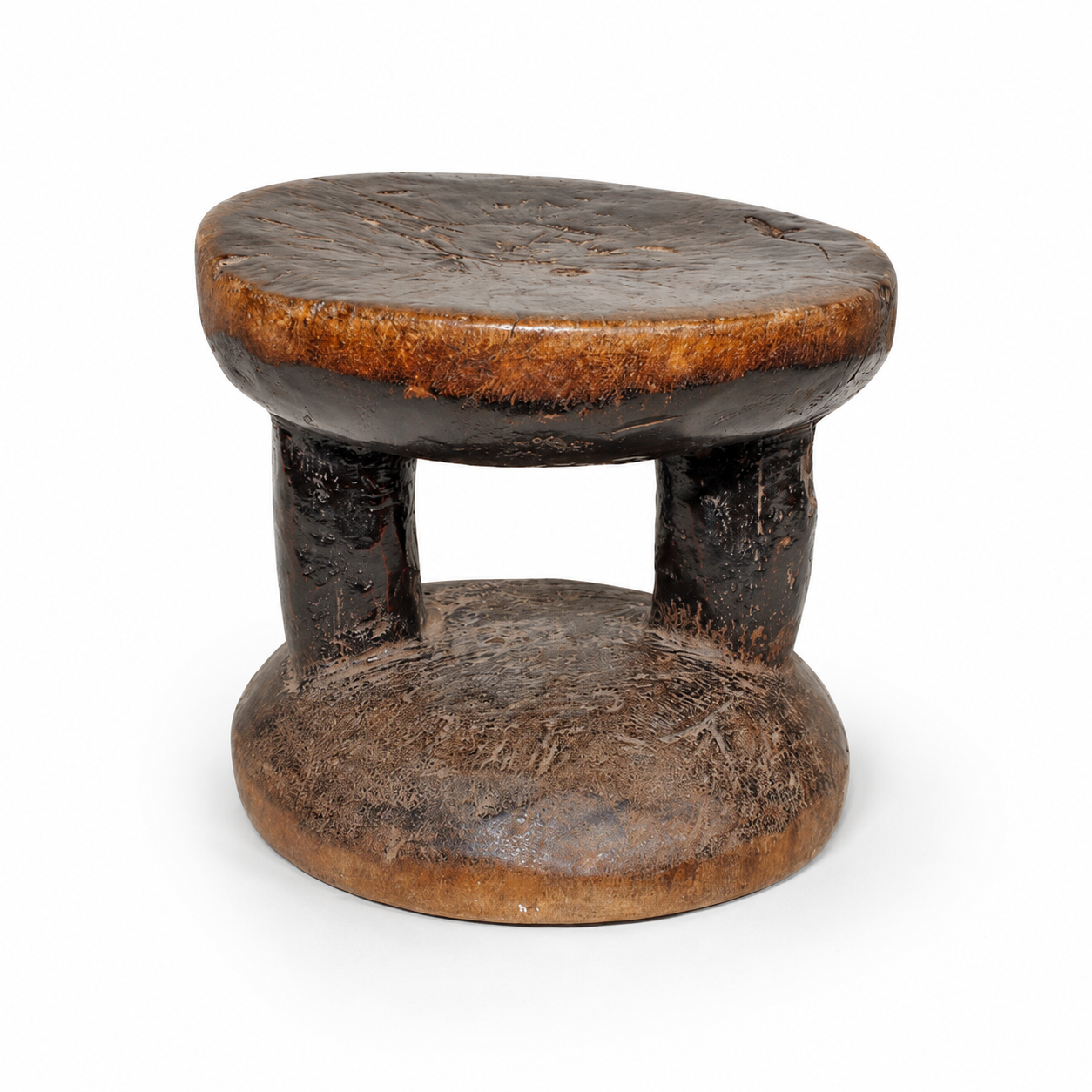 small round hand made wooden African table stool to be used as a small seat or table in a home decor