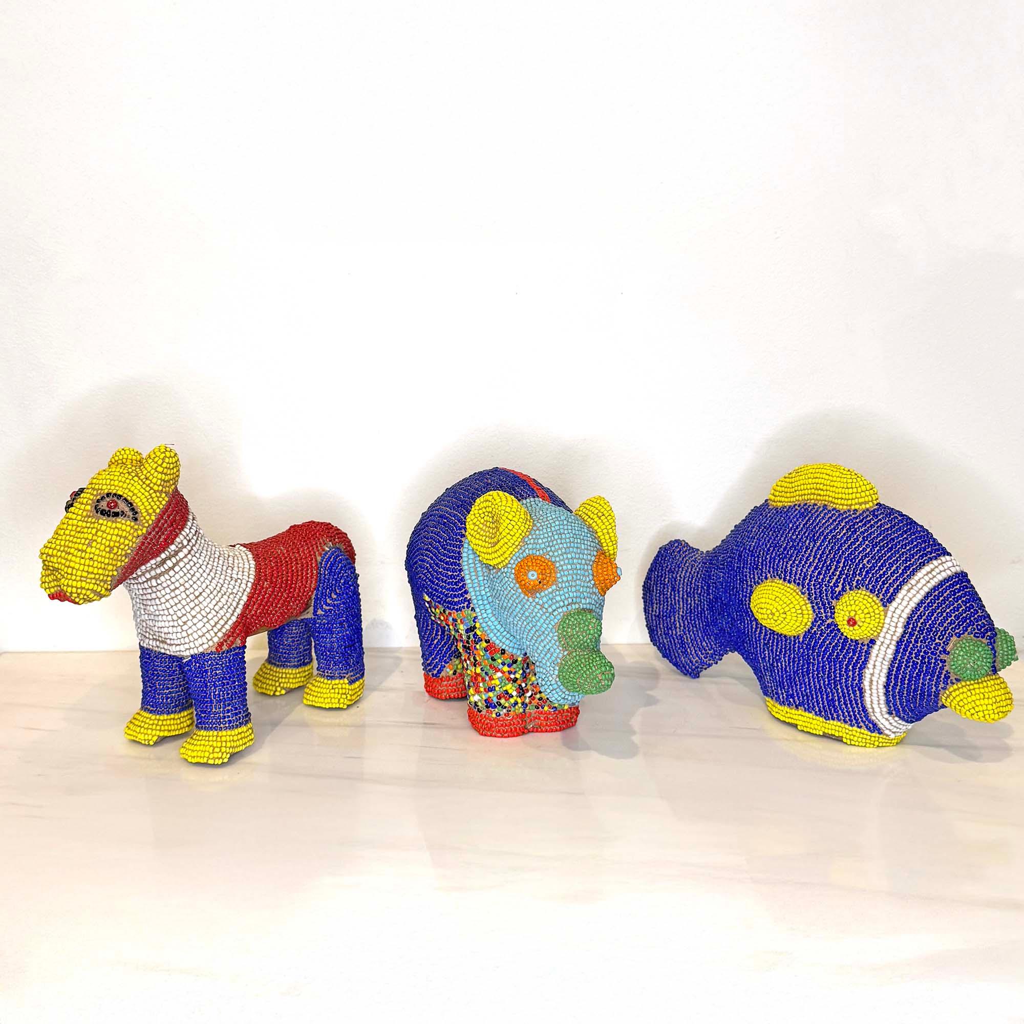Beaded Terracotta Bamileke Fish Sculpture from Cameroon - Small with other sculptures