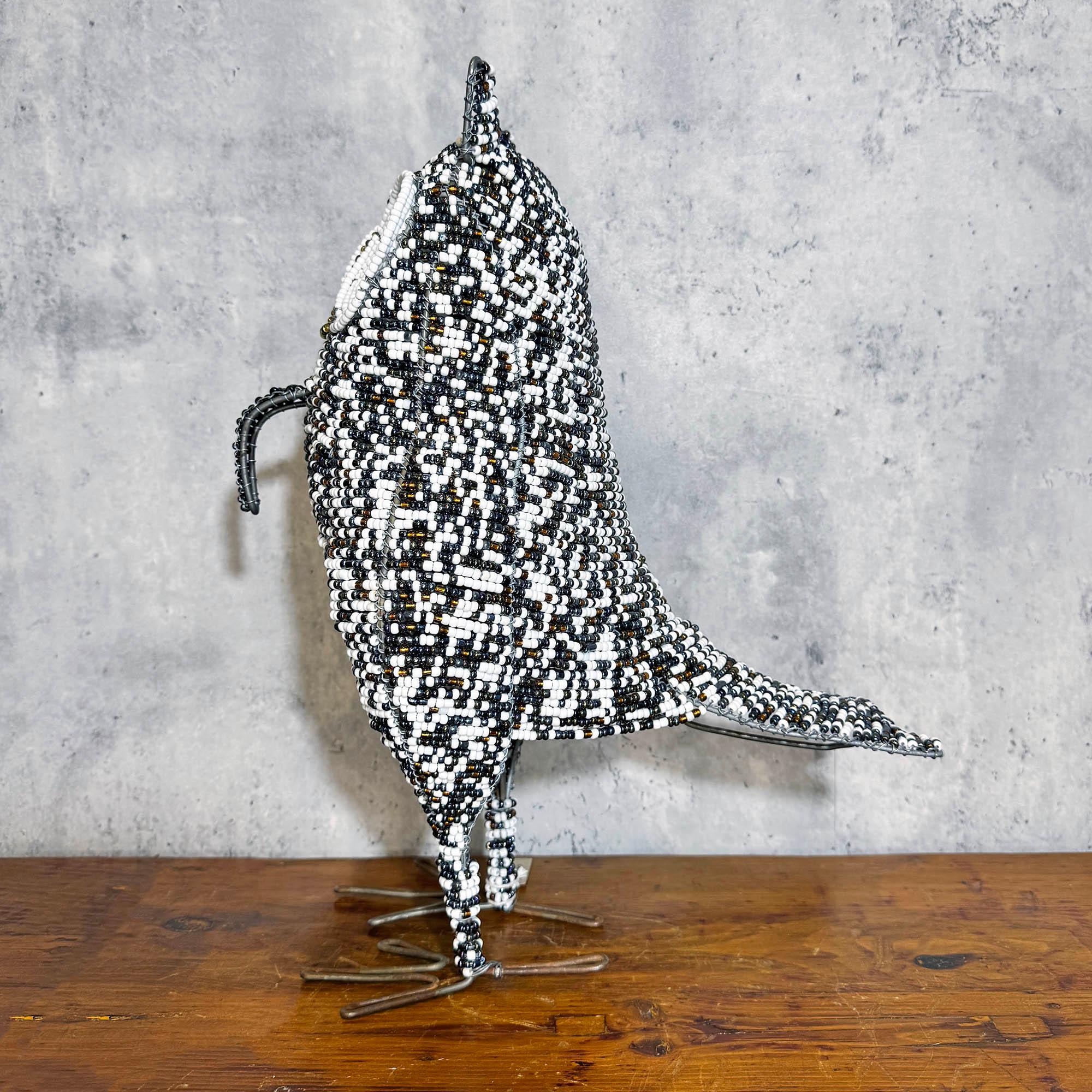 White Beaded Owl Sculpture from South Africa decorating a table