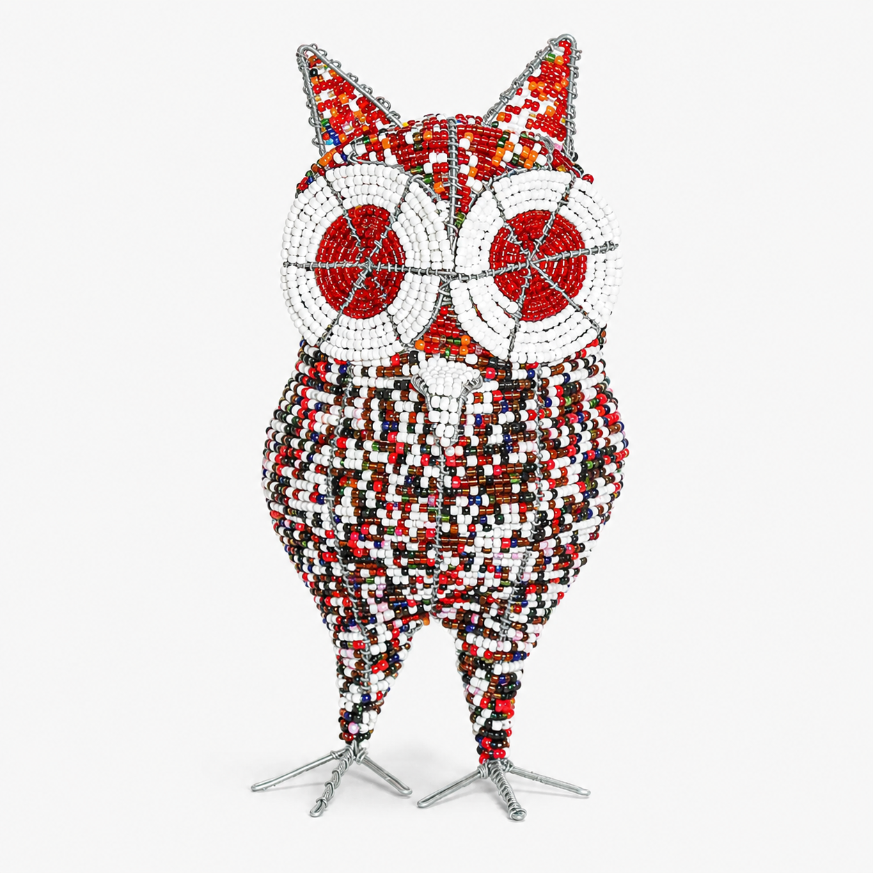 Colorful mosaic owl sculpture on a white background