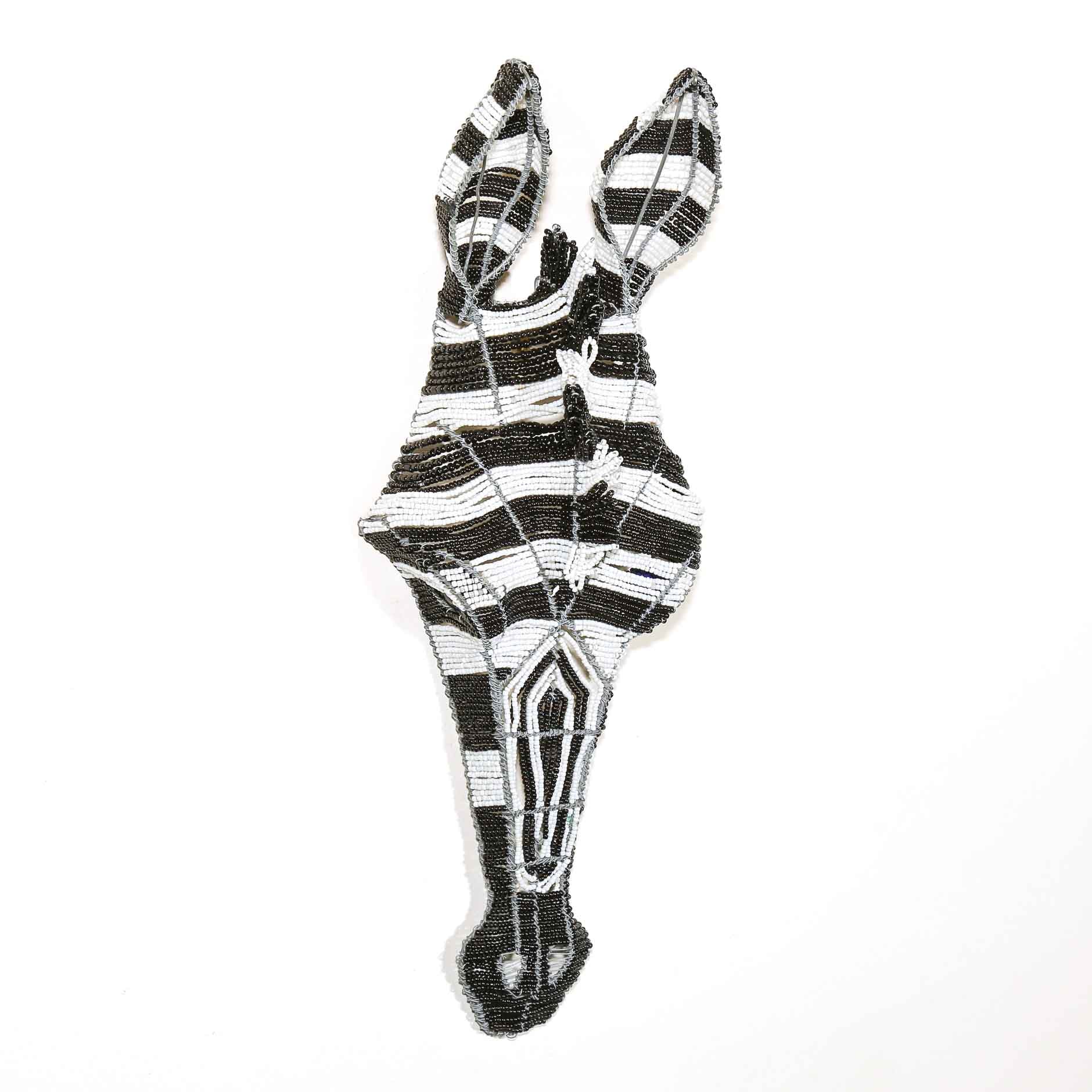black and white beaded sculpture of a Zebra head to hang on the wall
