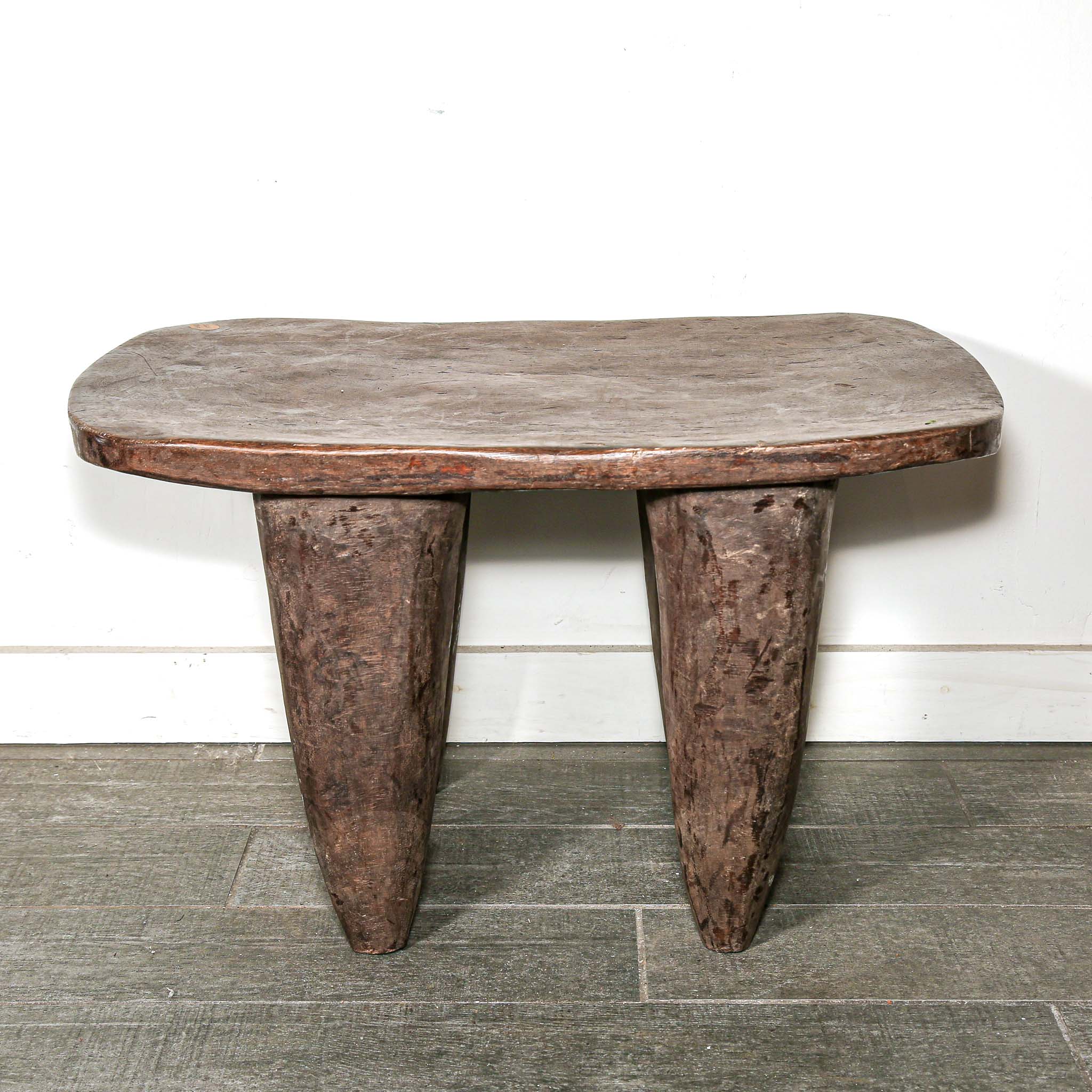 Wooden table with a natural, rustic finish from Africa with African style
