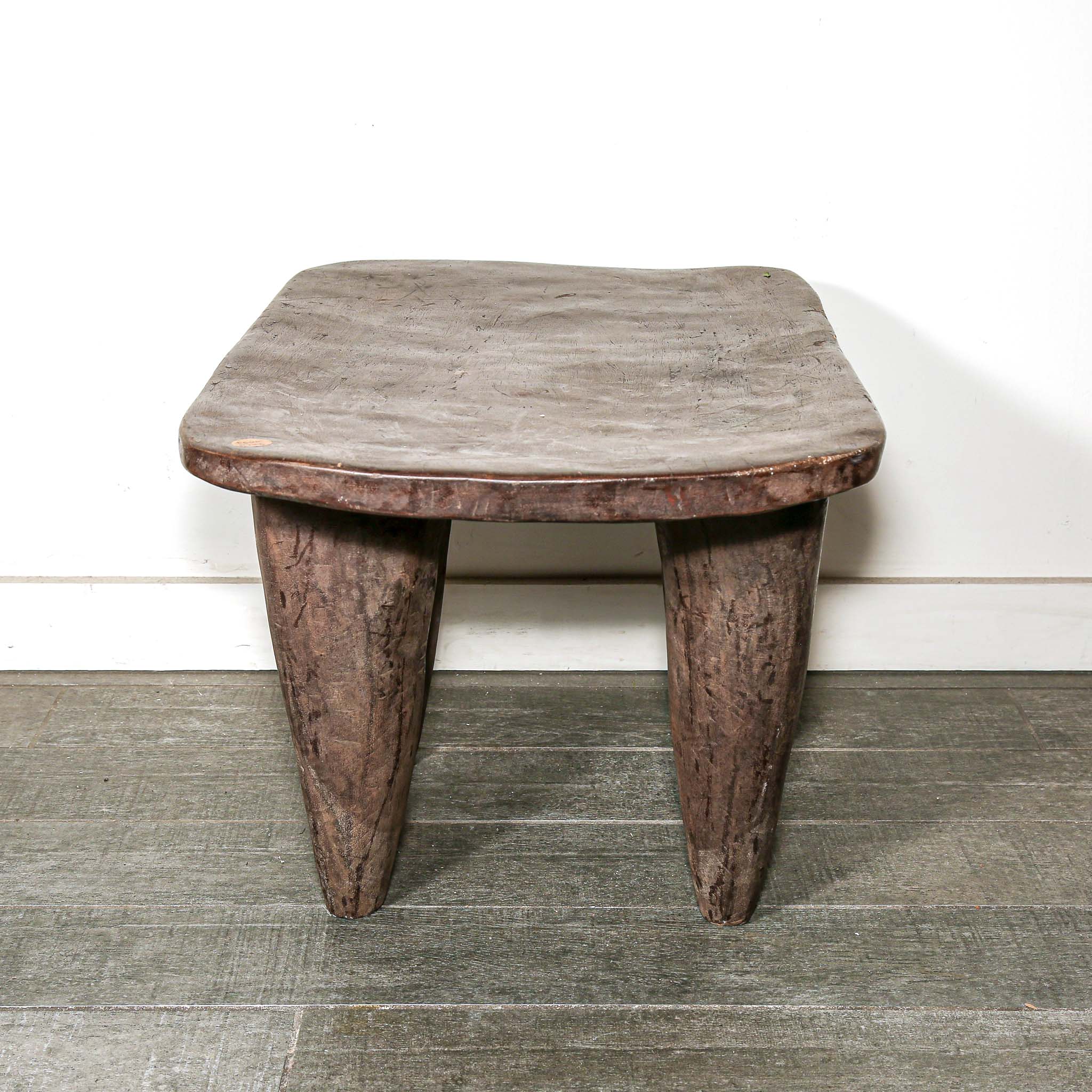 Wooden table with a natural, rustic finish from Africa with African style
