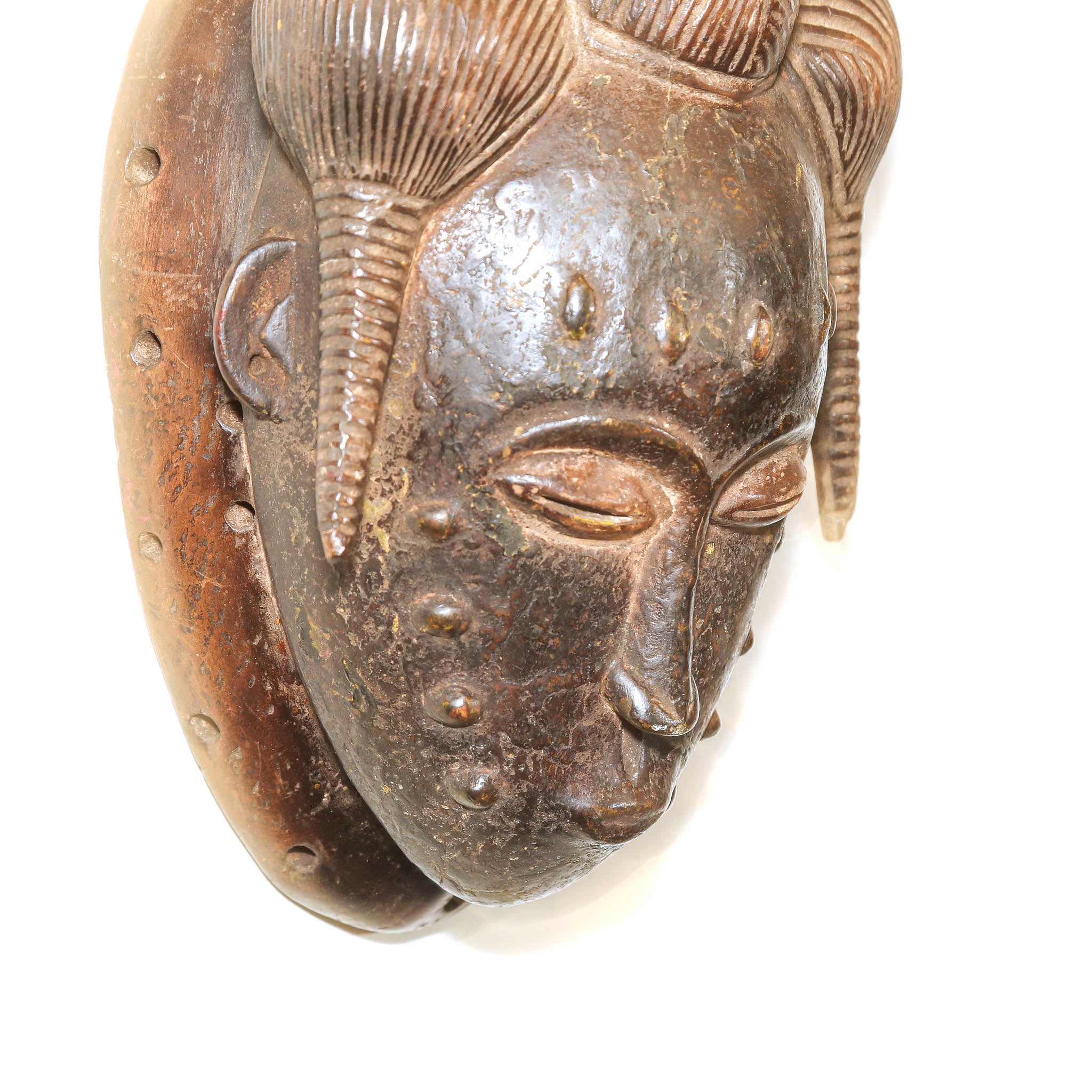 Decorative Baule mask with refined face and carved headdress
