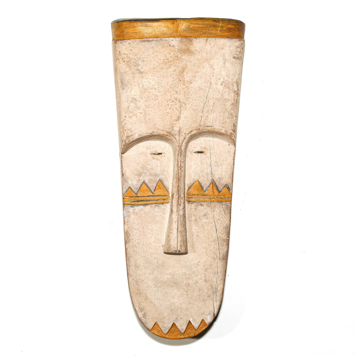 Traditional Fang face mask from Gabon with elongated carved features and a refined Central African sculptural form