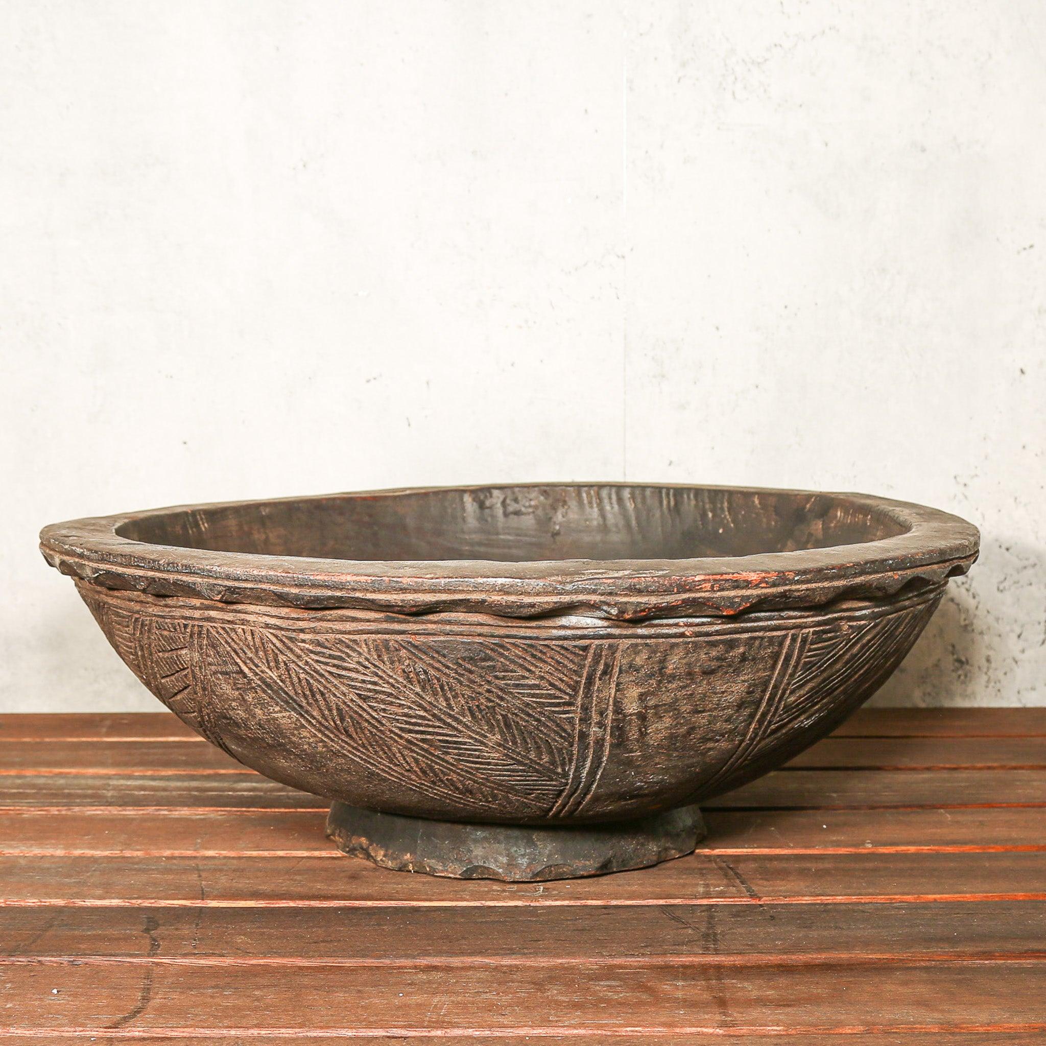 Hand shops carved African bowl