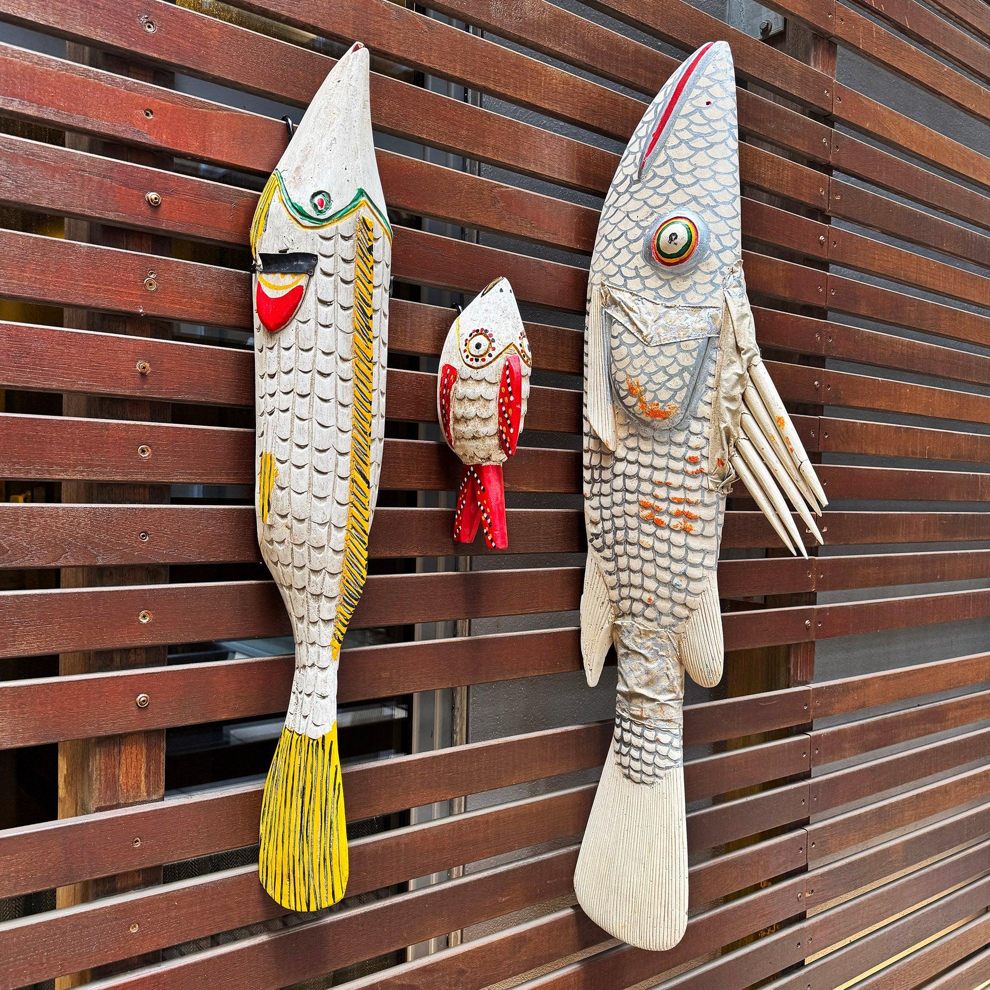 Bozo Fish Sculpture as an African Art for sale with other pieces