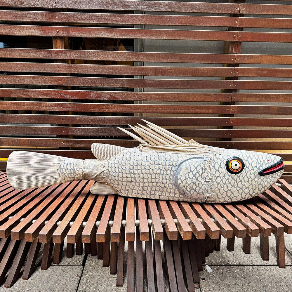 Bozo Fish Sculpture an African handicraft outside
