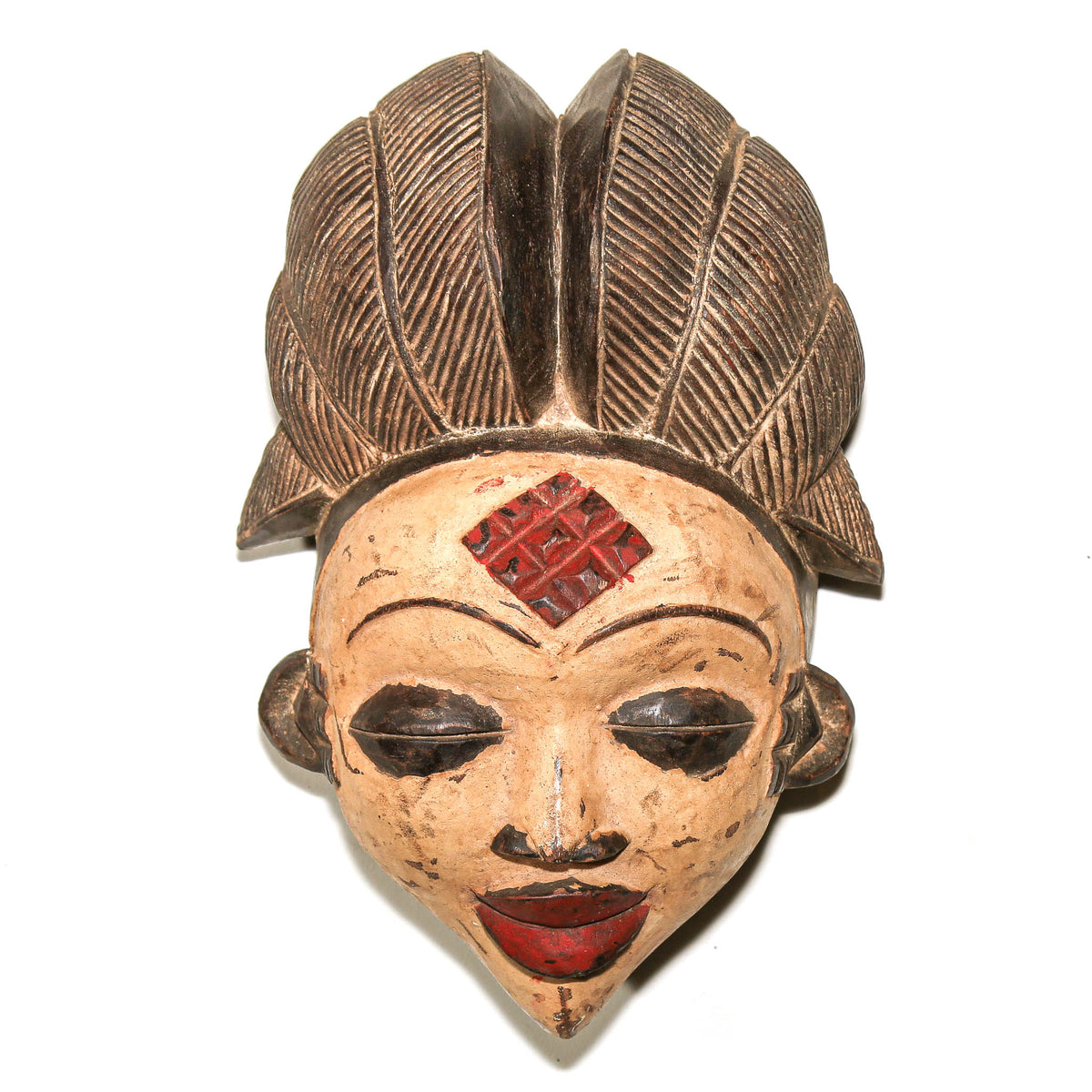 Large Punu mask from Gabon with refined carved facial features and a strong traditional Central African sculptural form