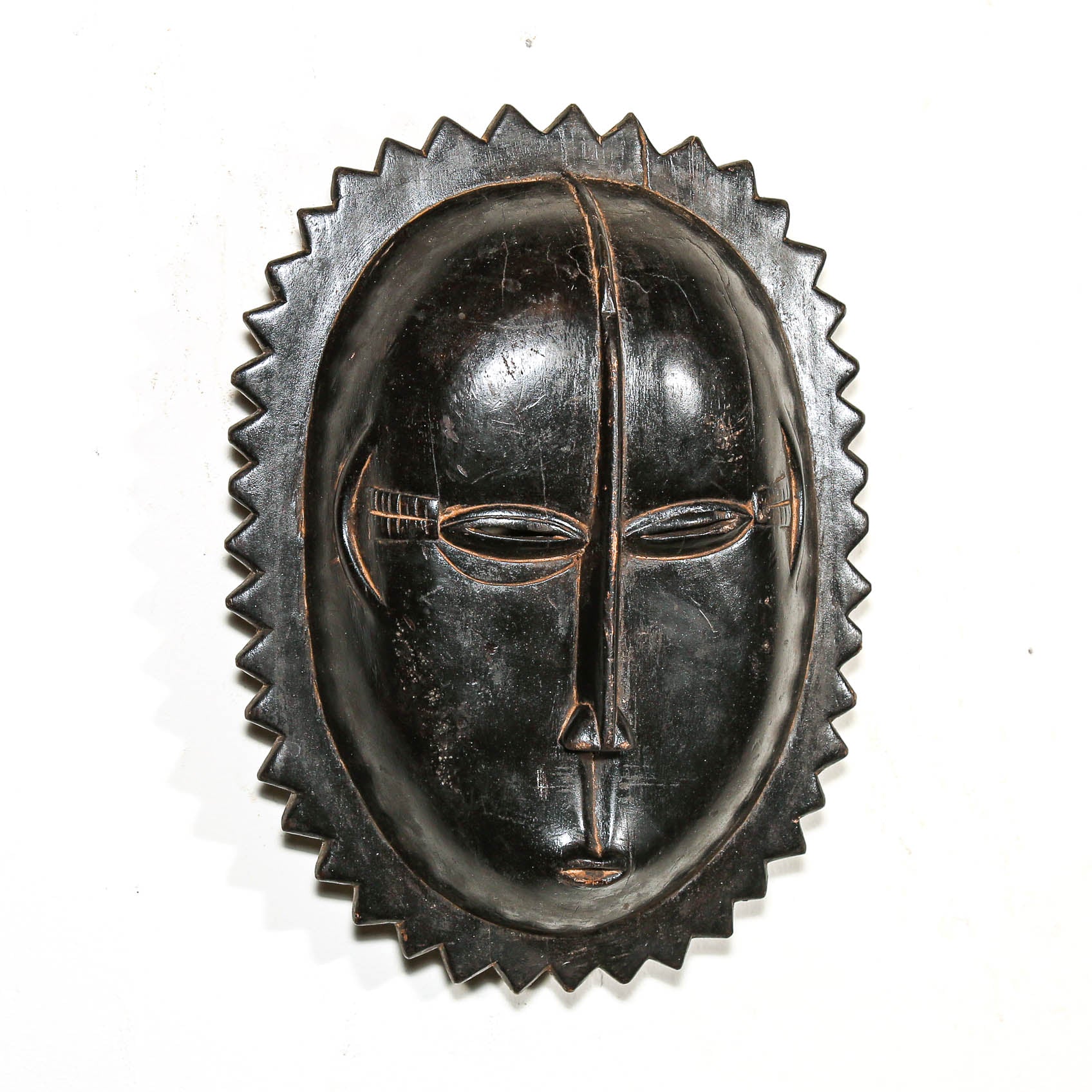 Black art with a detailed face on a white background