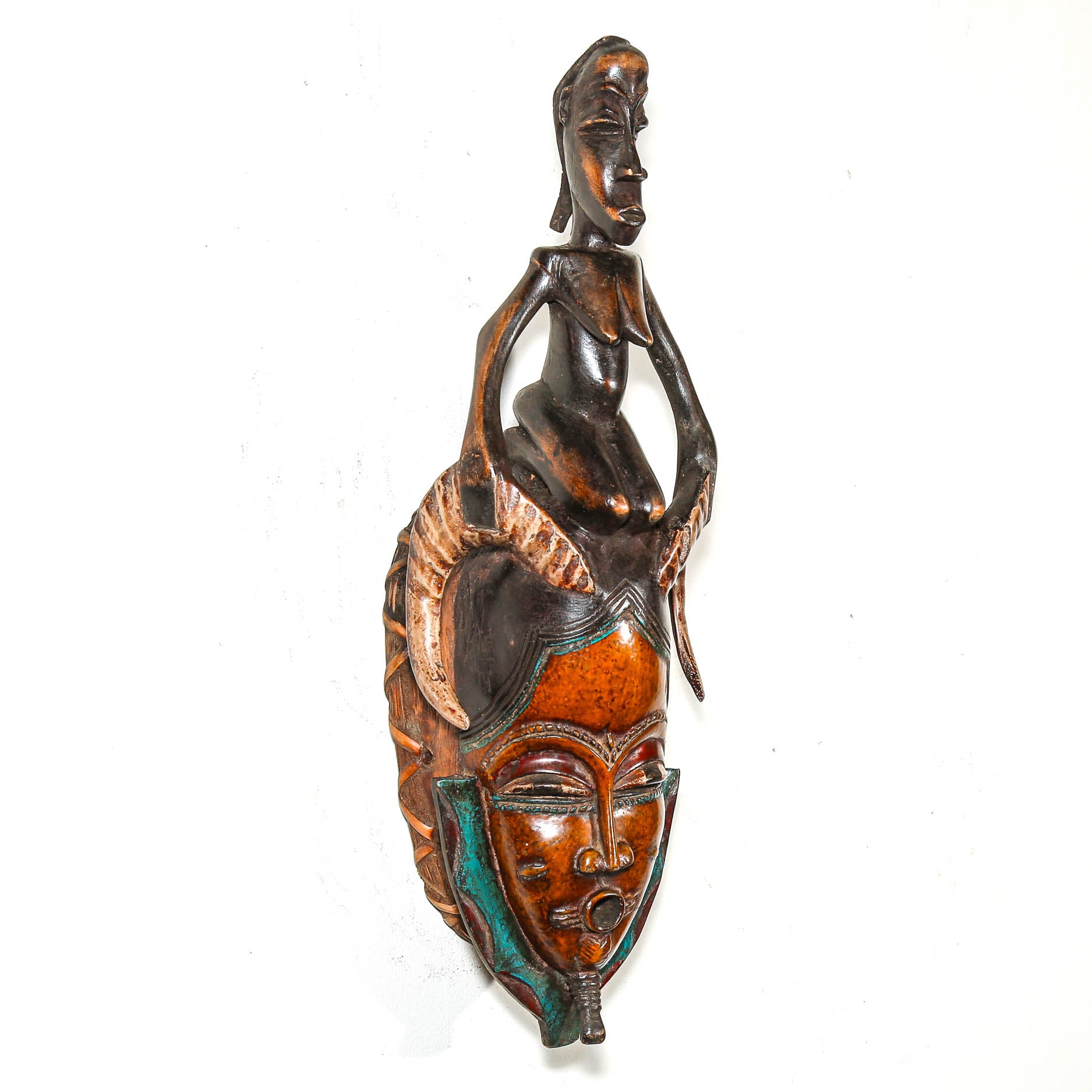 Decorative wall art with an African design on a white background
