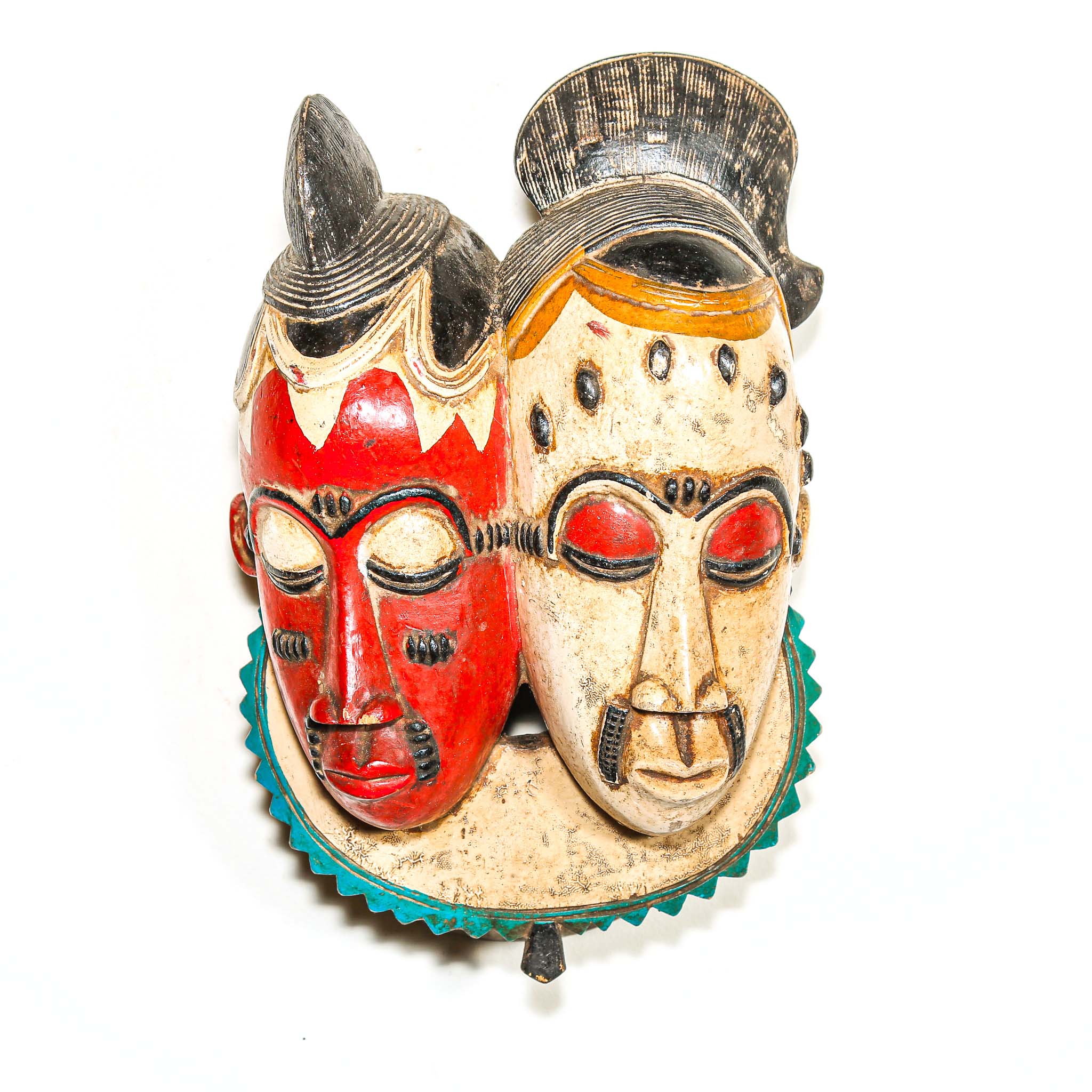 Pair of decorative masks with red and beige faces on a white background