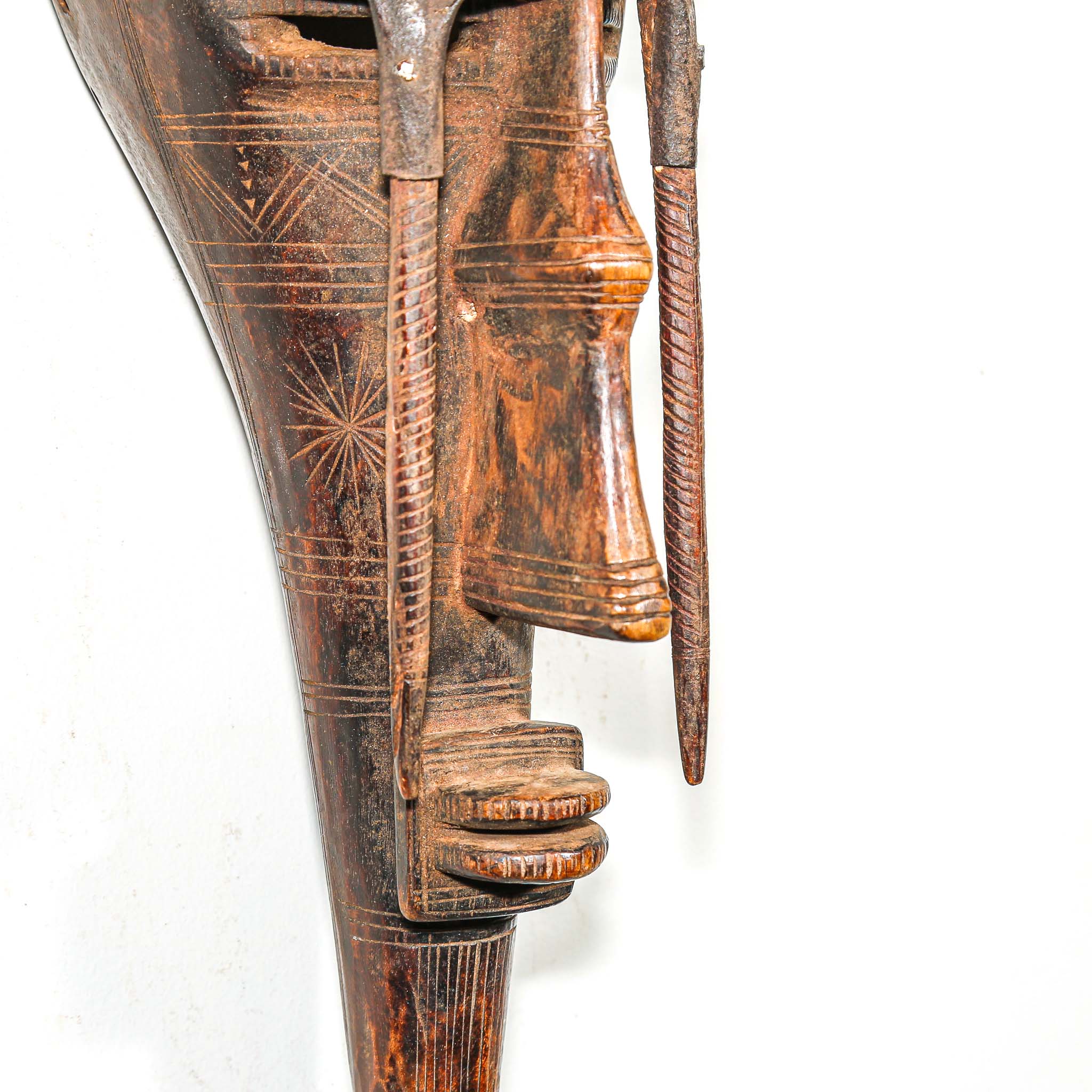 African Wooden and metal mask with intricate carvings for sale online