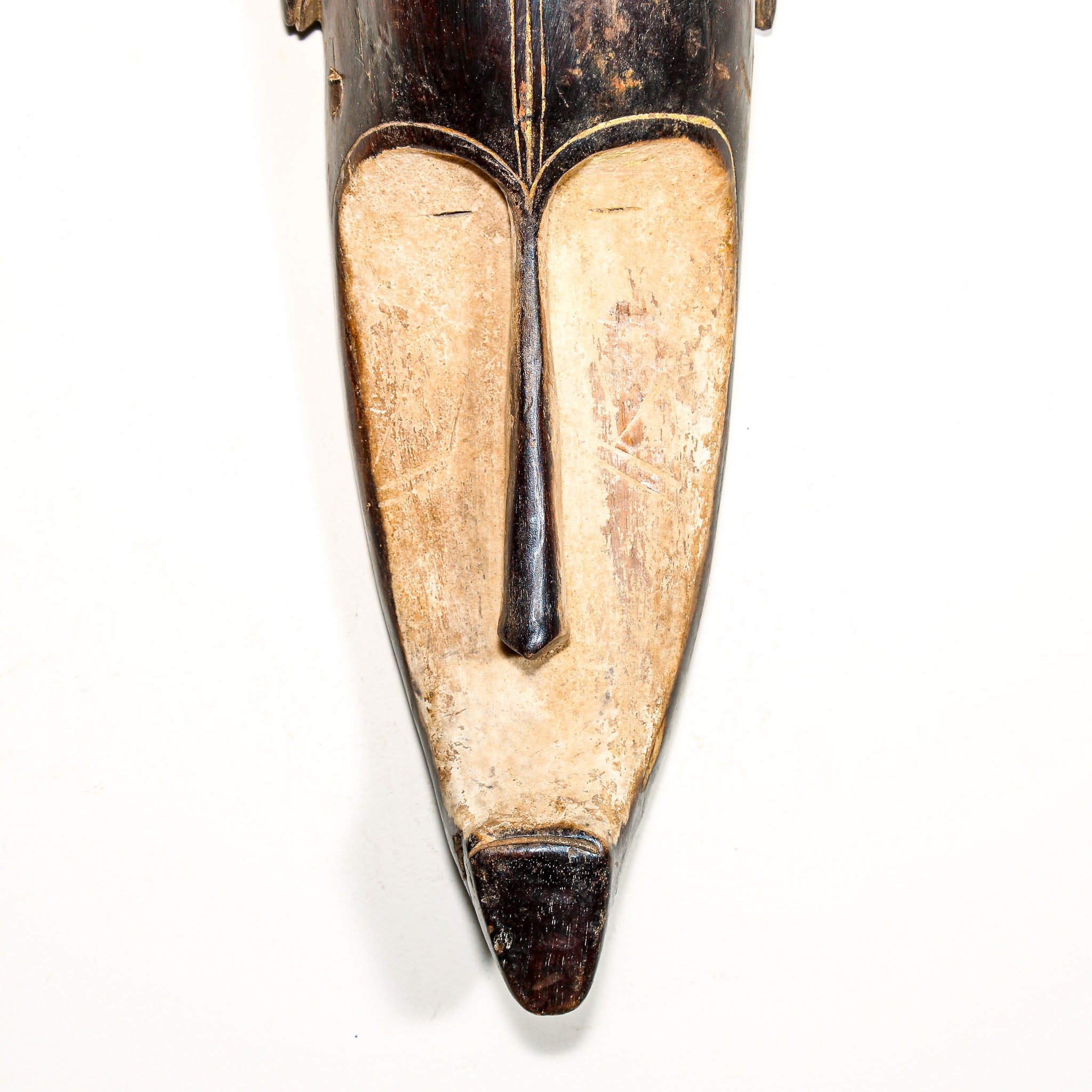 Wooden African vintage mask with modern face design for sale to display in the home