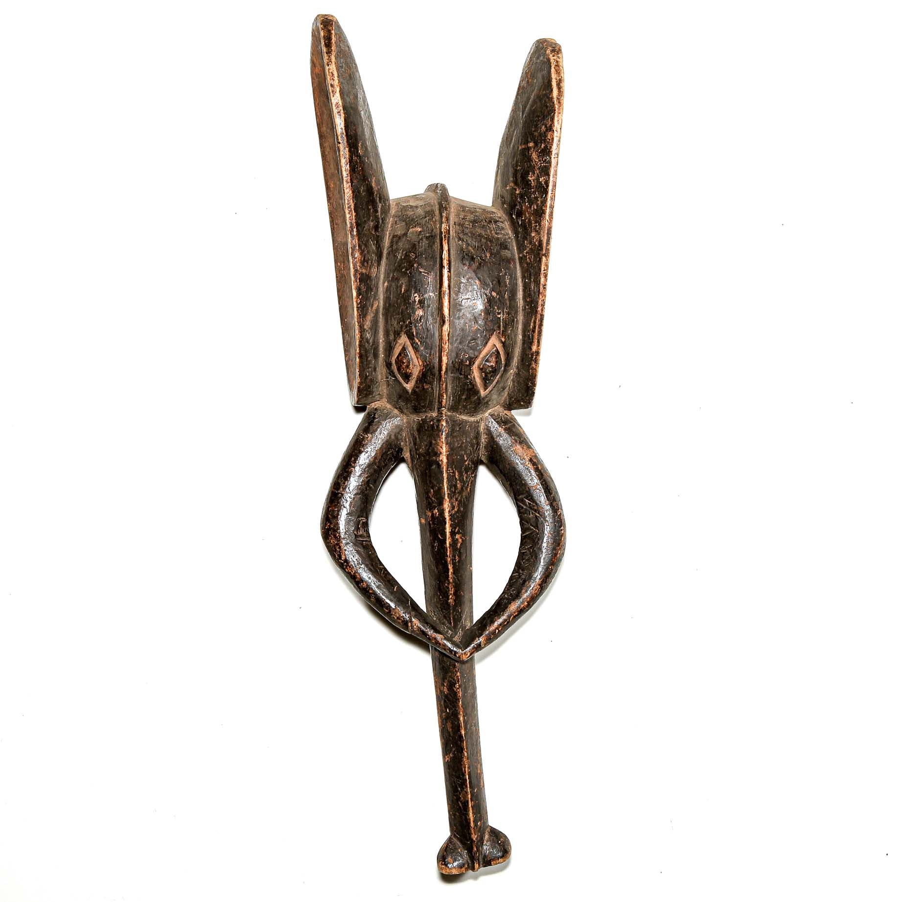 stylized black art from African in the shape of an Elephant. Collectable art from Africa for interior design