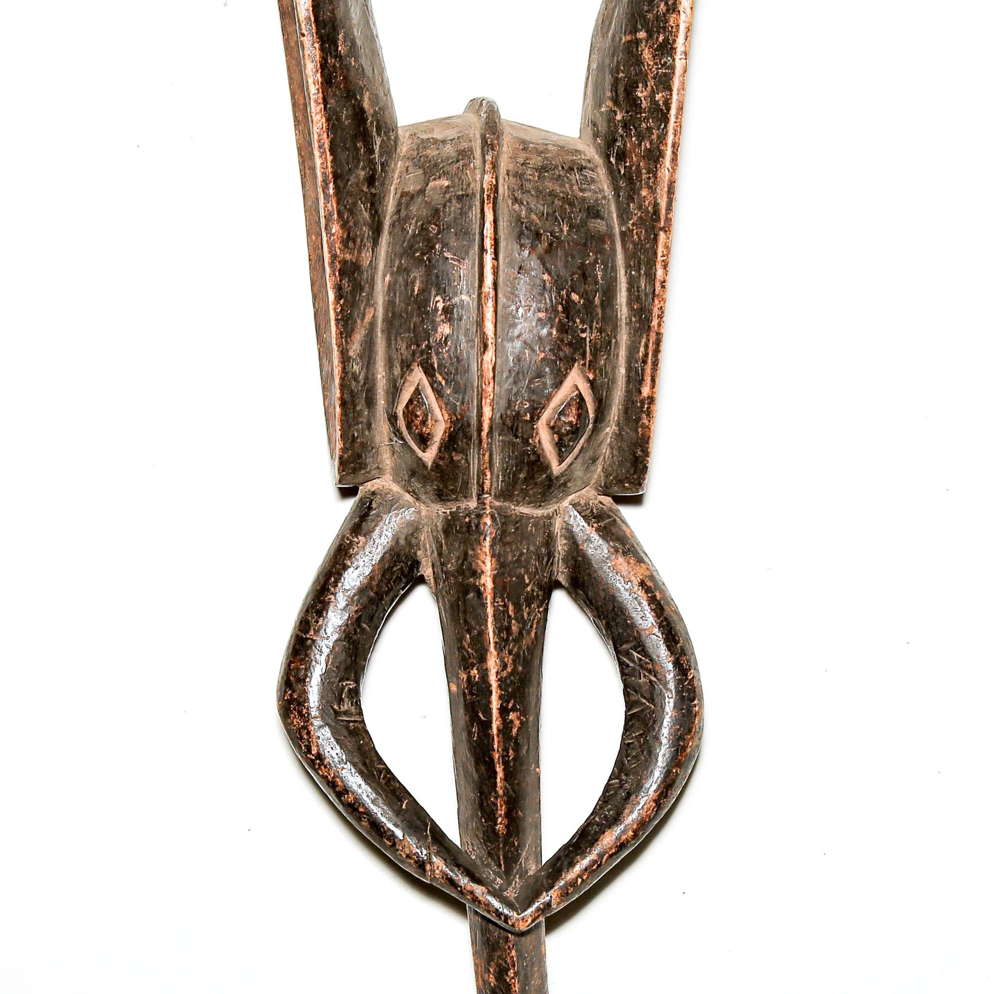 stylized black art from African in the shape of an Elephant. Collectable art from Africa for interior design