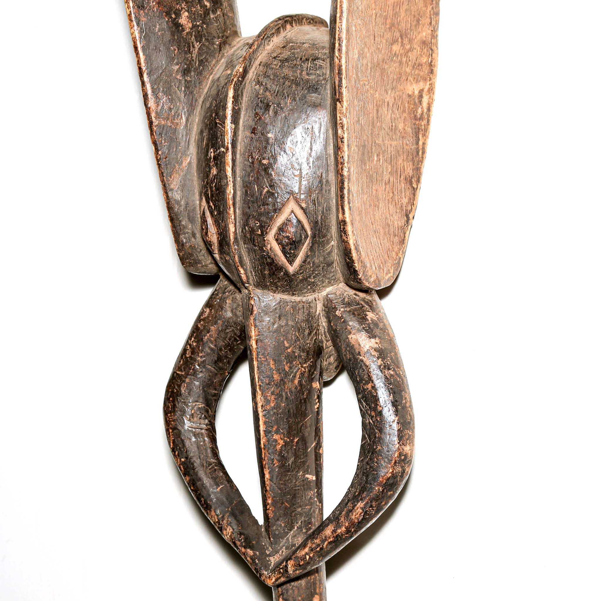 stylized black art from African in the shape of an Elephant. Collectable art from Africa for interior design