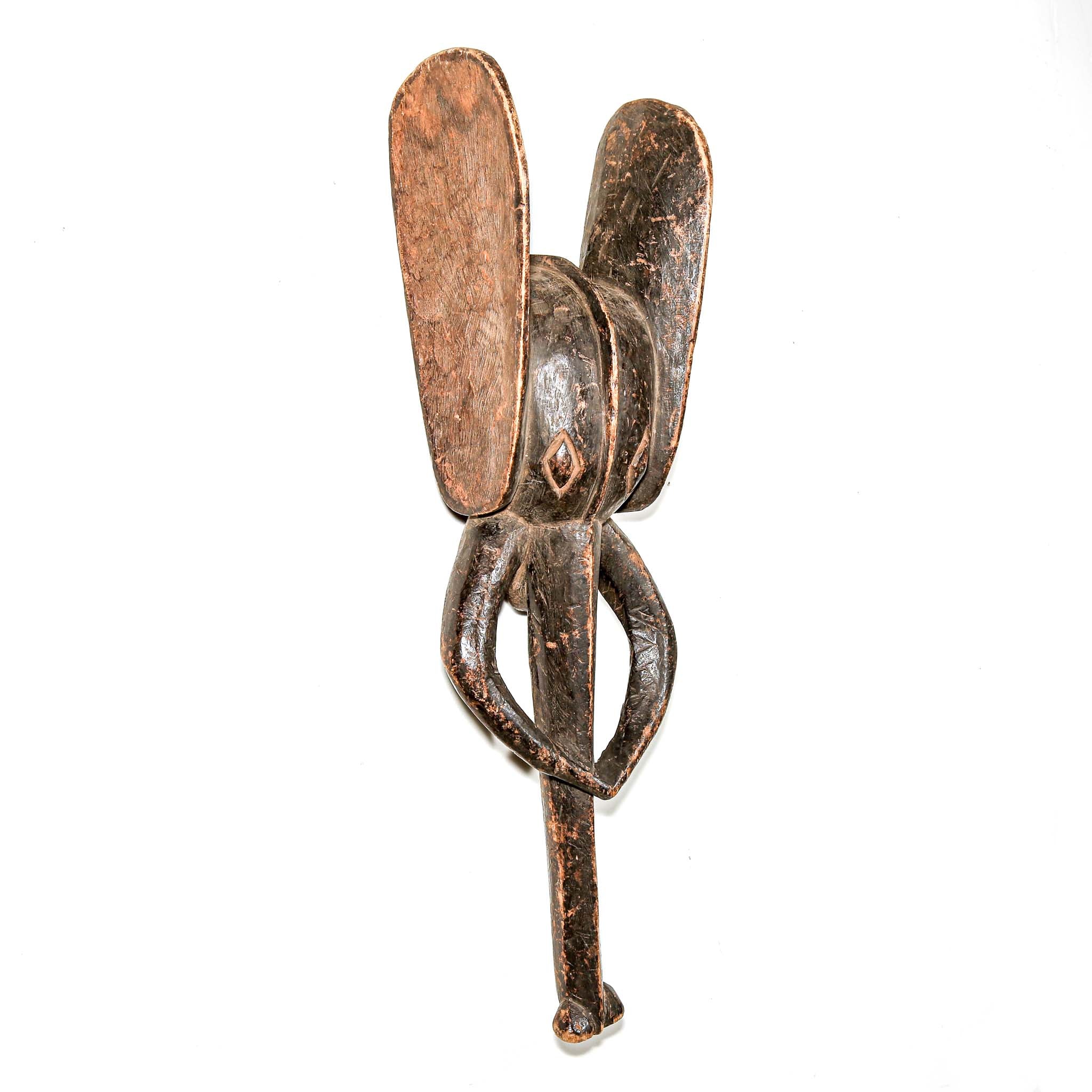 stylized black art from African in the shape of an Elephant. Collectable art from Africa for interior design