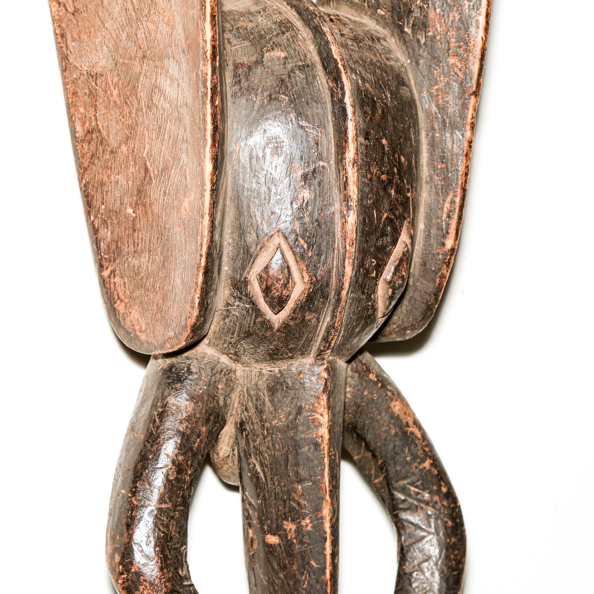 stylized black art from African in the shape of an Elephant. Collectable art from Africa for interior design