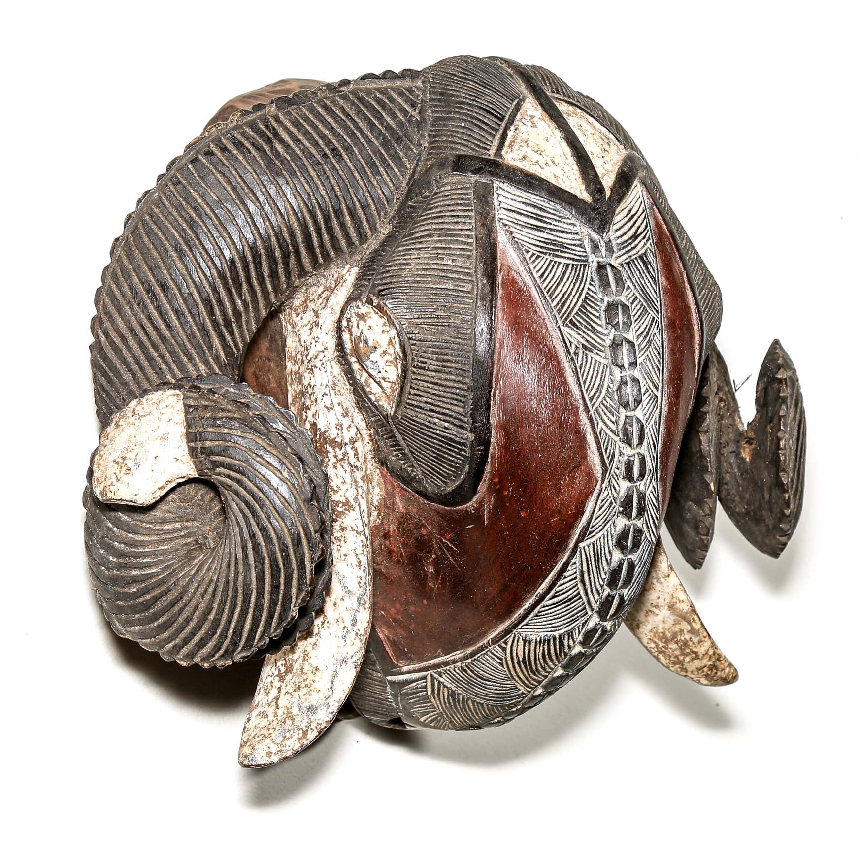 Baule masks, originating from the Baule people of Ivory Coast, are significant in their heritage, particularly in the context of the dance.
The ram motif represents the spirit of agriculture in Balue mythology. They are danced during mulptiple ceremonies including the harvest, royal visitors, wedding and funerals.
While traditional masks have deep symbolic meanings related to ancestors, spirits, and social roles, decorative Baule masks primarily focus on capturing the artistic cultural beauty