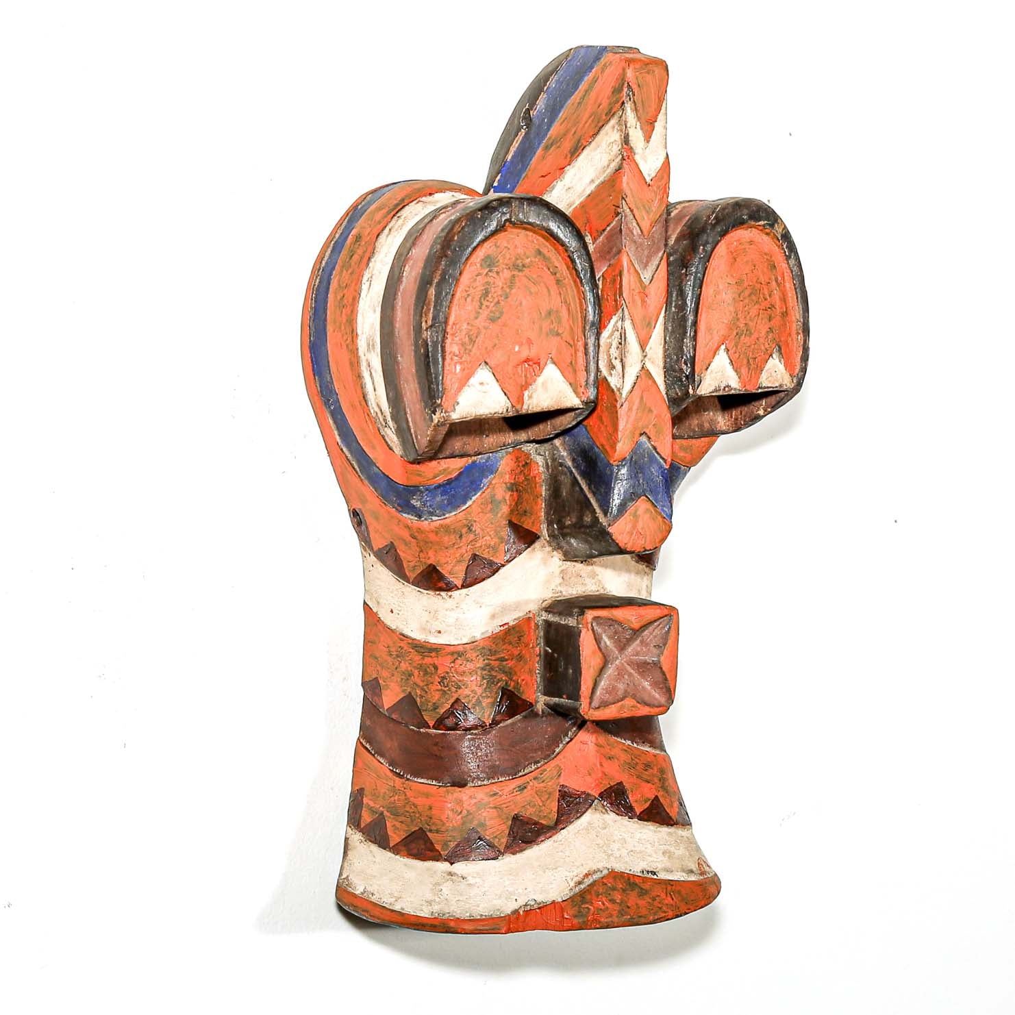 Colorful wooden elephant figurine on a white background
