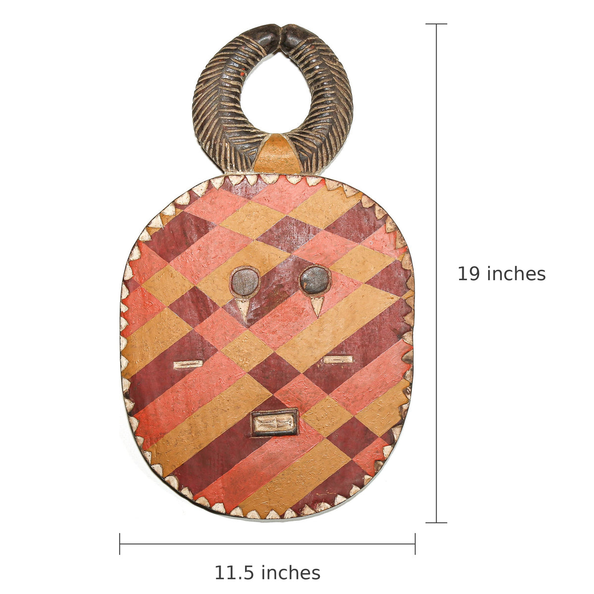 A decorative carved wooden wall hanging or mask plaque with a looped top handle, shown on a white background with dimension lines indicating 19 inches tall and 11.5 inches wide.