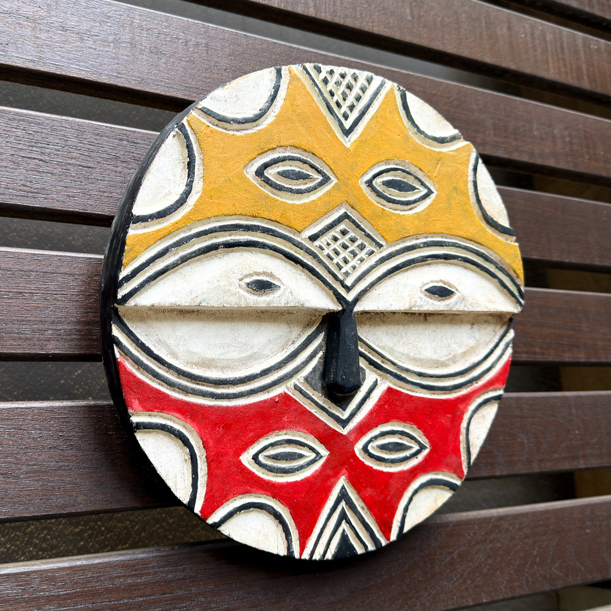 Hand-carved Teke African mask featuring strong geometric styling and a distinctive sculptural form from Congo