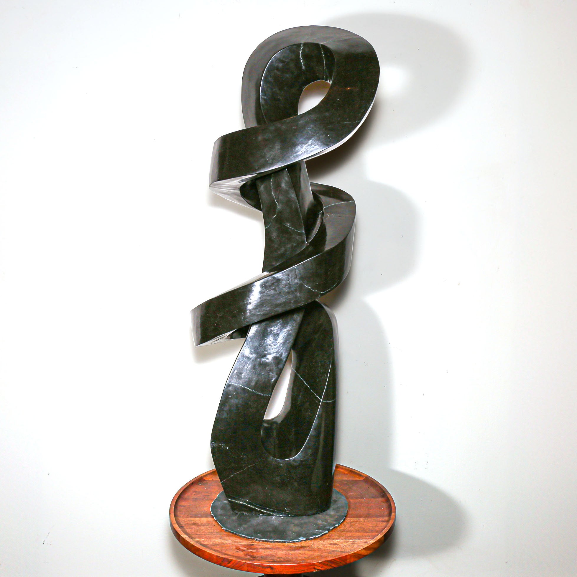 "Continuum" Abstract Sculpture by D. Musekiwa carved in black stone