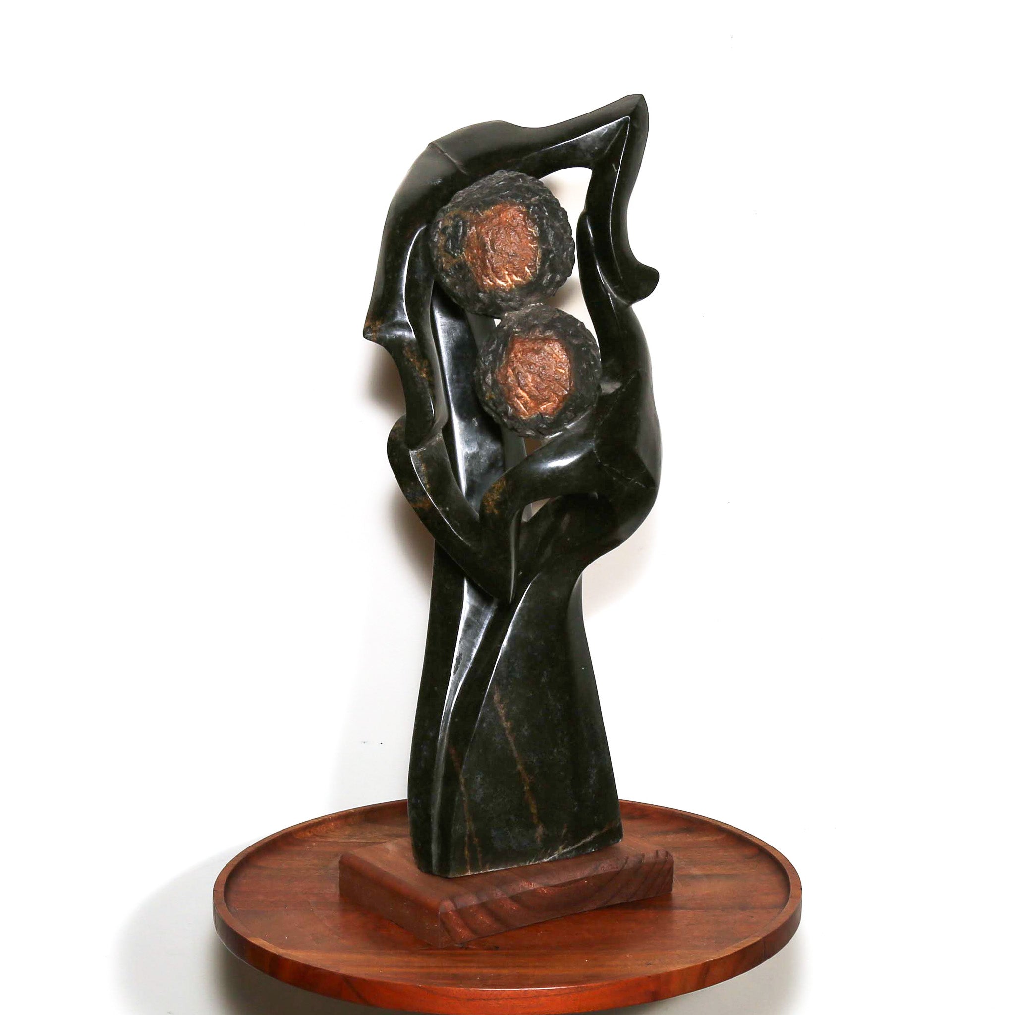 mother and son dancing sculpture