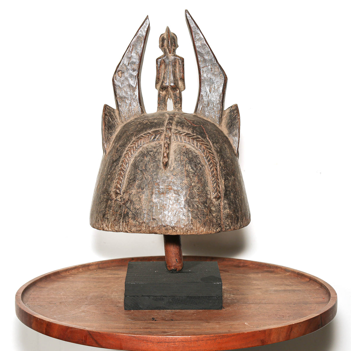 West African Senufo helmet mask from Ivory Coast with sculptural horns and ceremonial Noo mask design