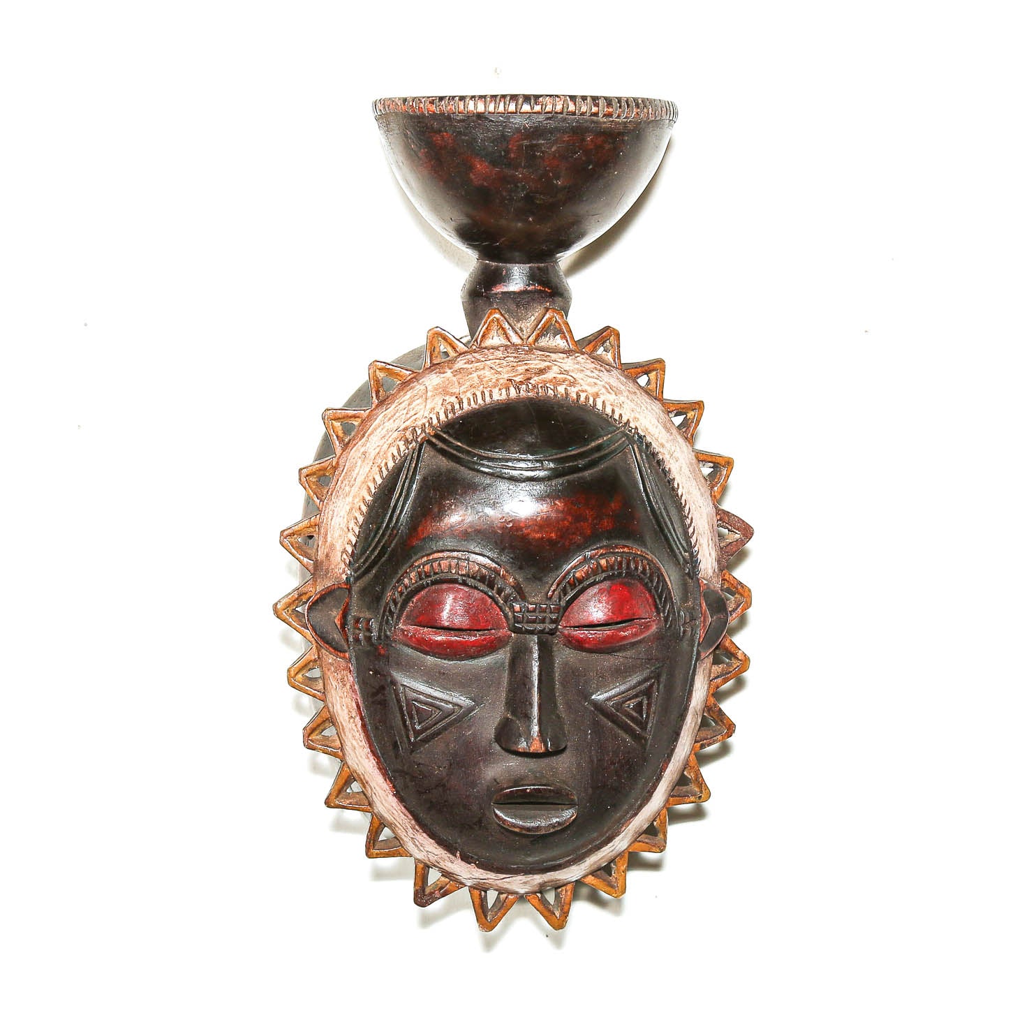 Traditional Baule sun mask with carved circular form