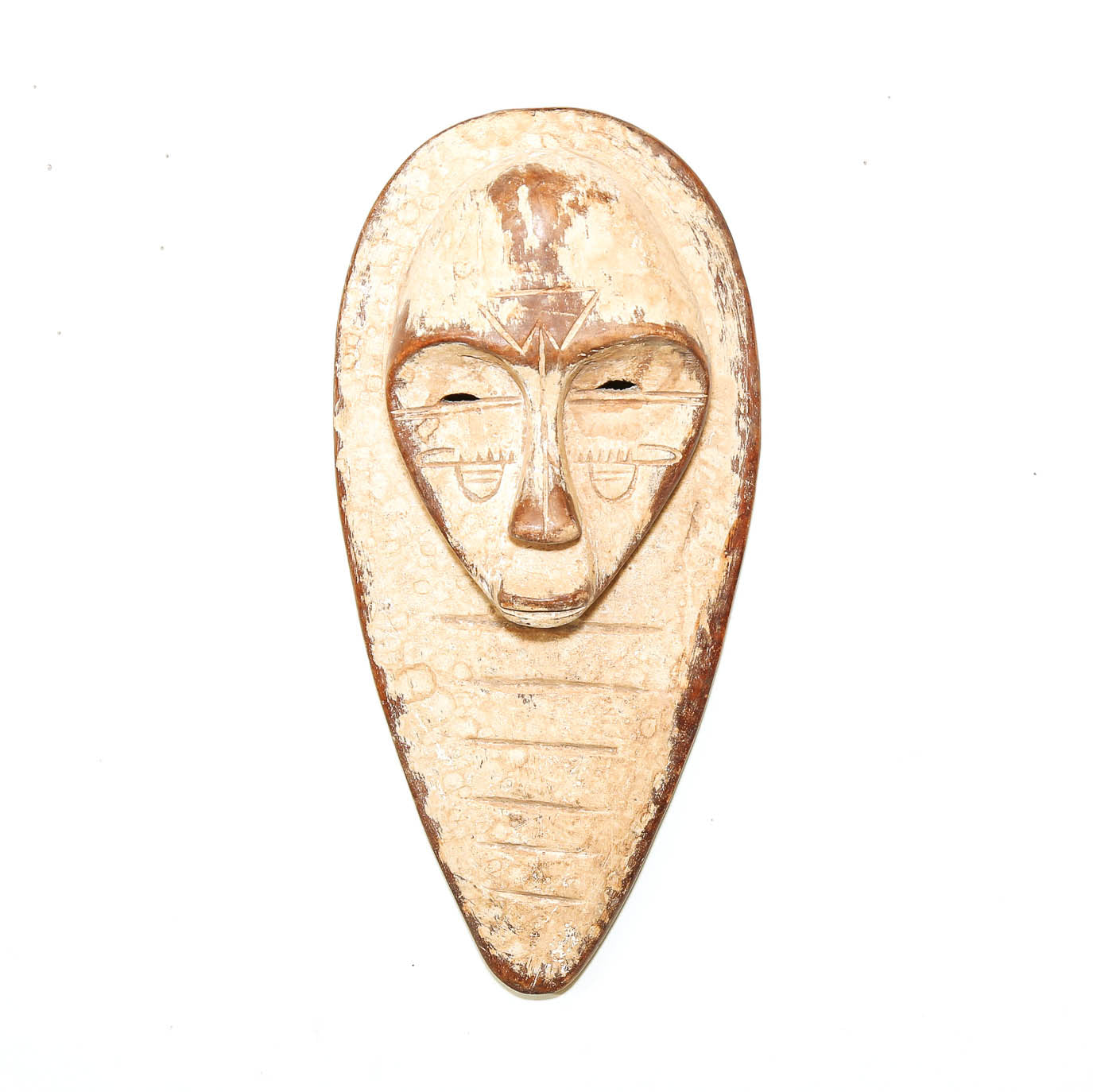 White Fang style mask from Gabon with carved facial features